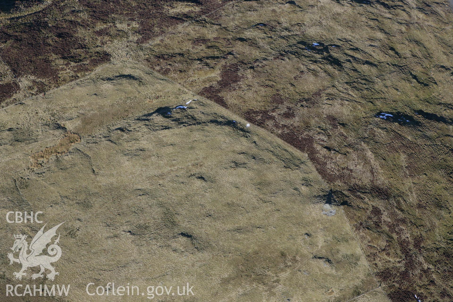 RCAHMW colour oblique photograph of Pen-y-Foel Goch cairn. Taken by Toby Driver on 08/03/2010.