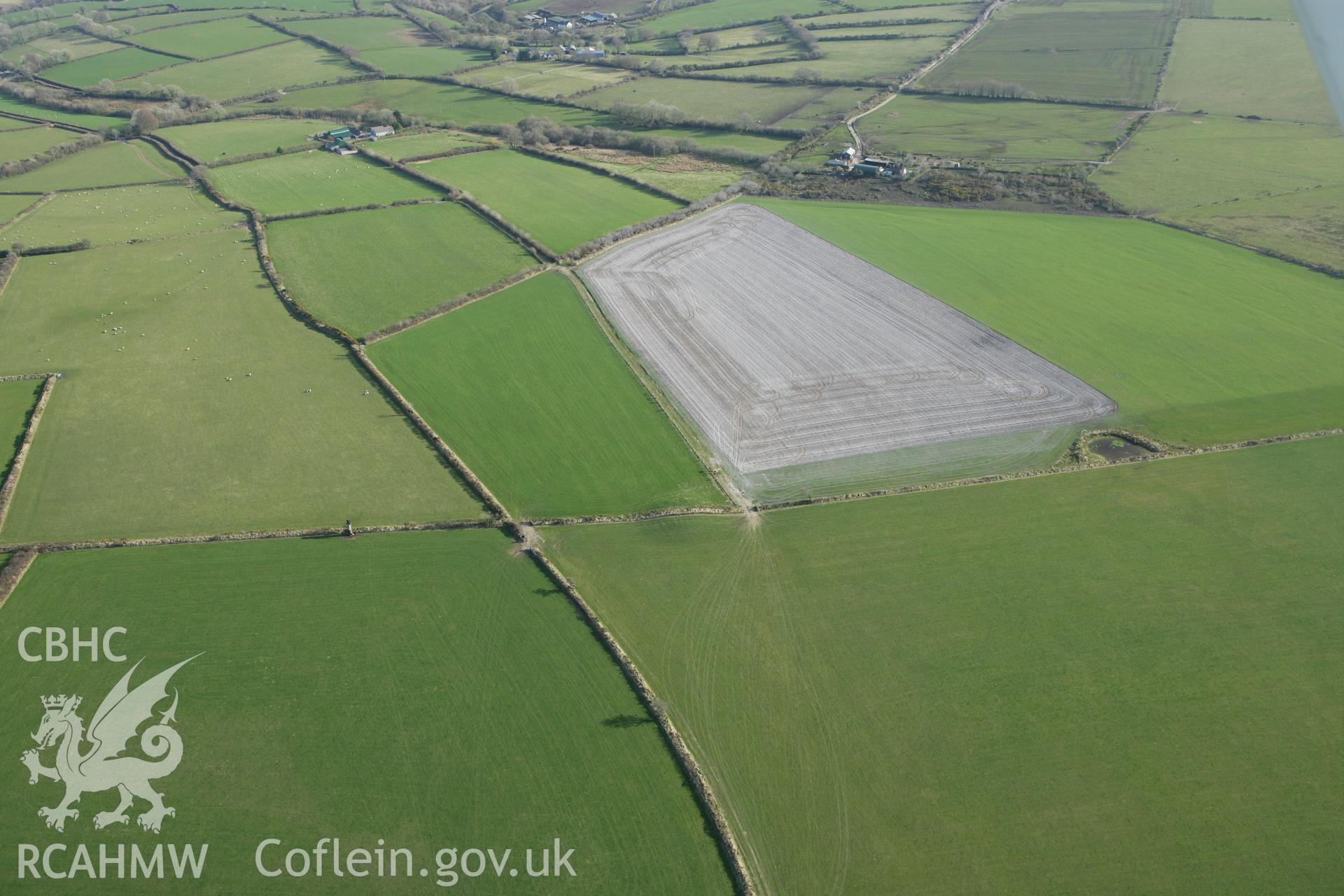 RCAHMW colour oblique aerial photograph of Crug-Ebolion, West Cilrhedyn. Taken on 13 April 2010 by Toby Driver