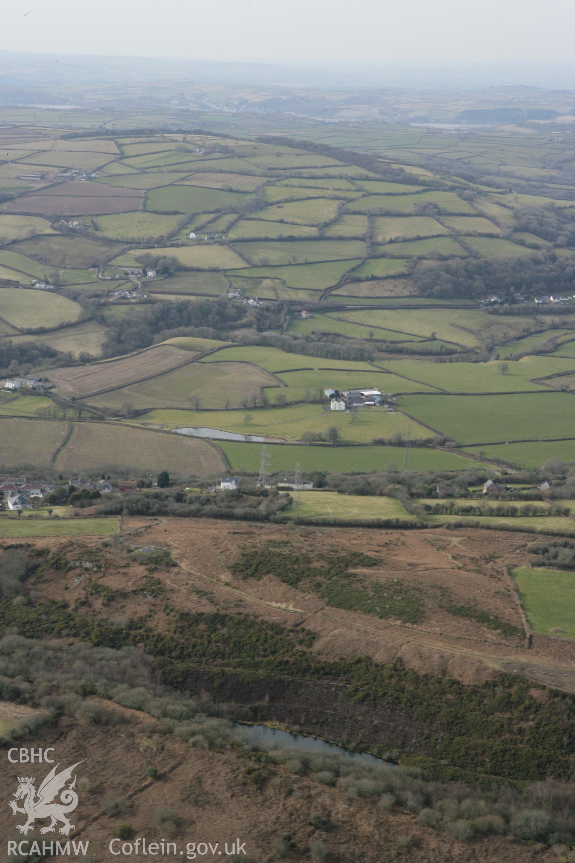 RCAHMW colour oblique photograph of Maes Gwenllian battlesite. Taken by Toby Driver on 02/03/2010.