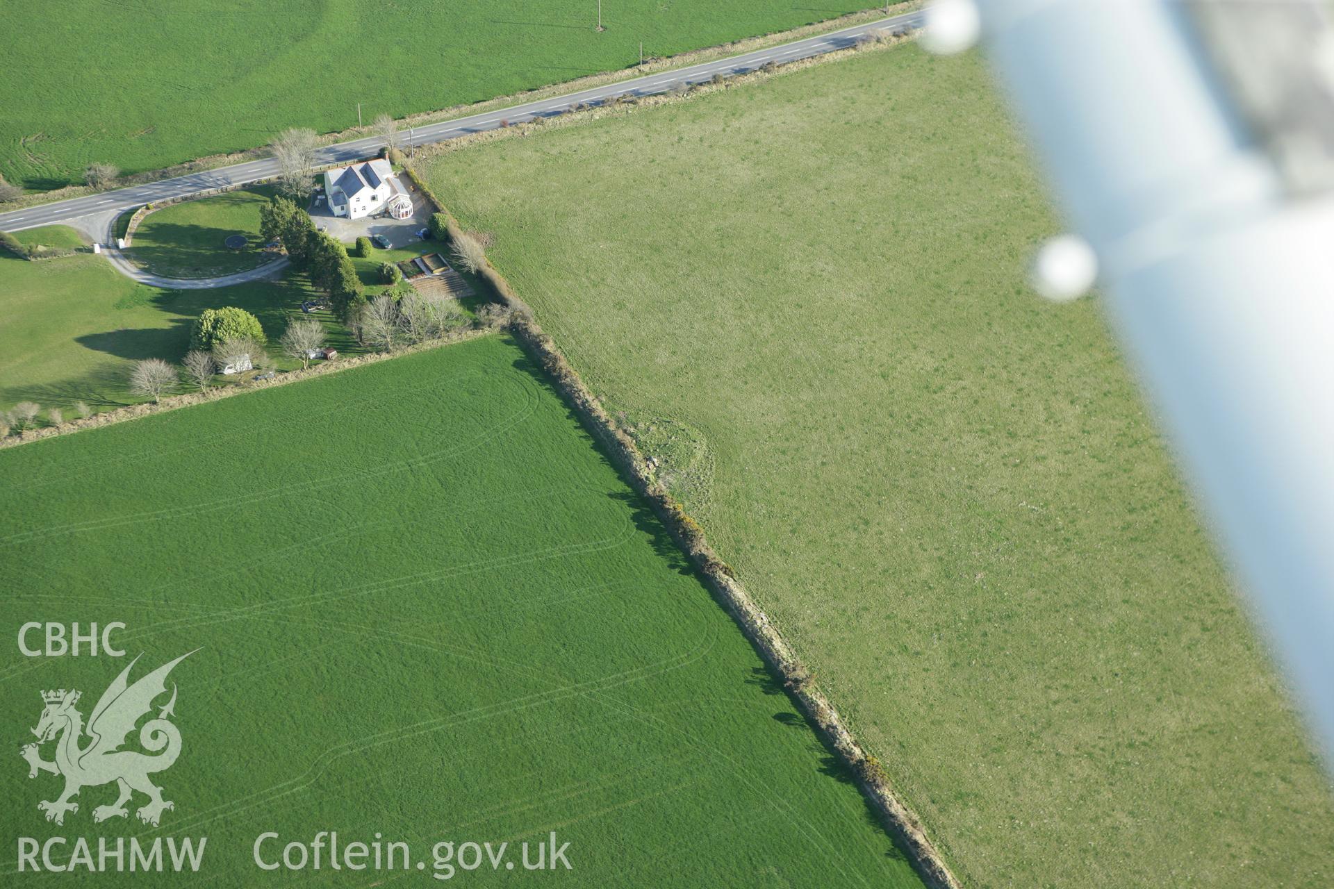 RCAHMW colour oblique aerial photograph of Glandymawr Cairn Circle. Taken on 13 April 2010 by Toby Driver