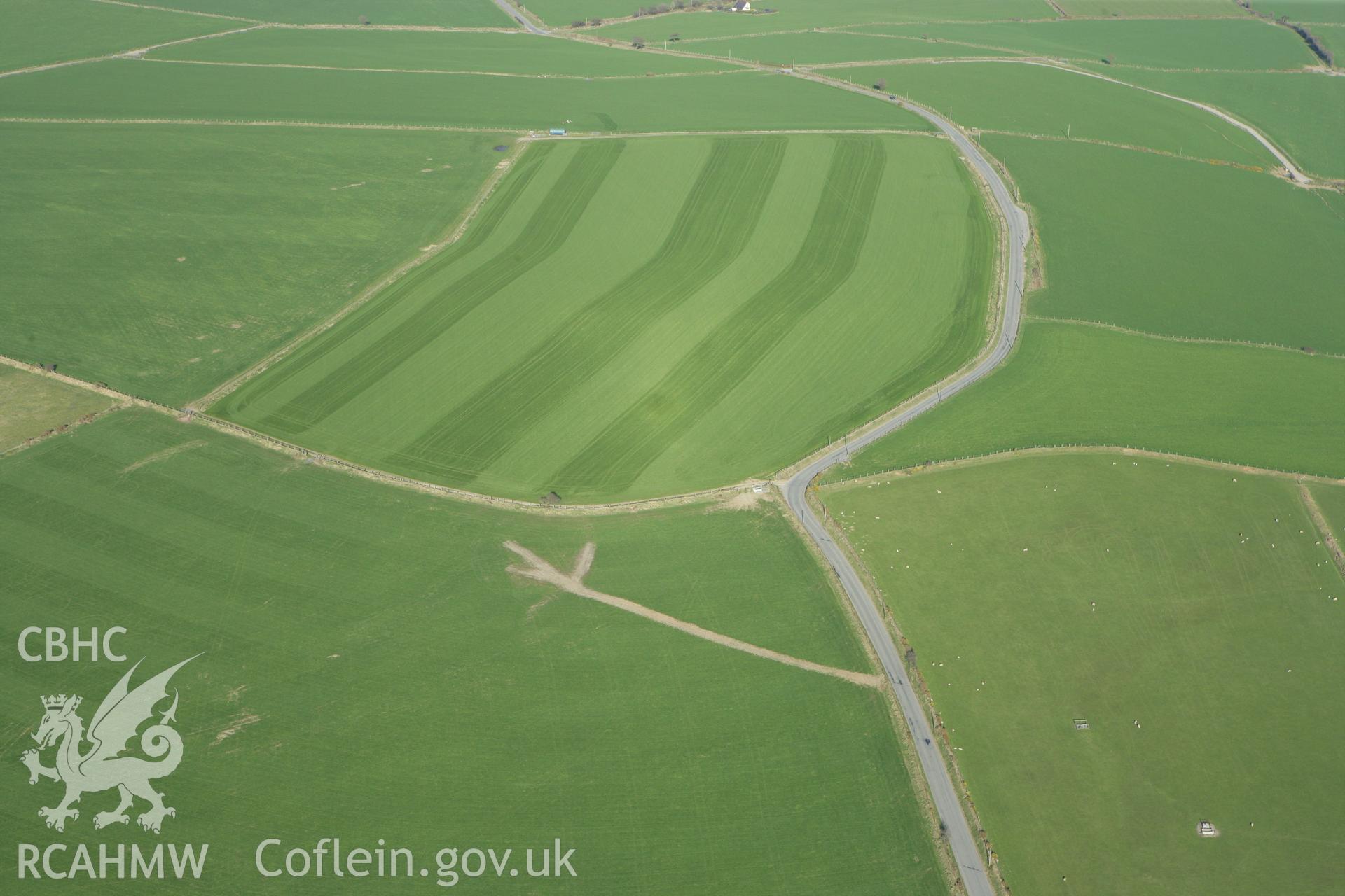 RCAHMW colour oblique aerial photograph of Rhos Goch Cairn, Penrhydd. Taken on 13 April 2010 by Toby Driver