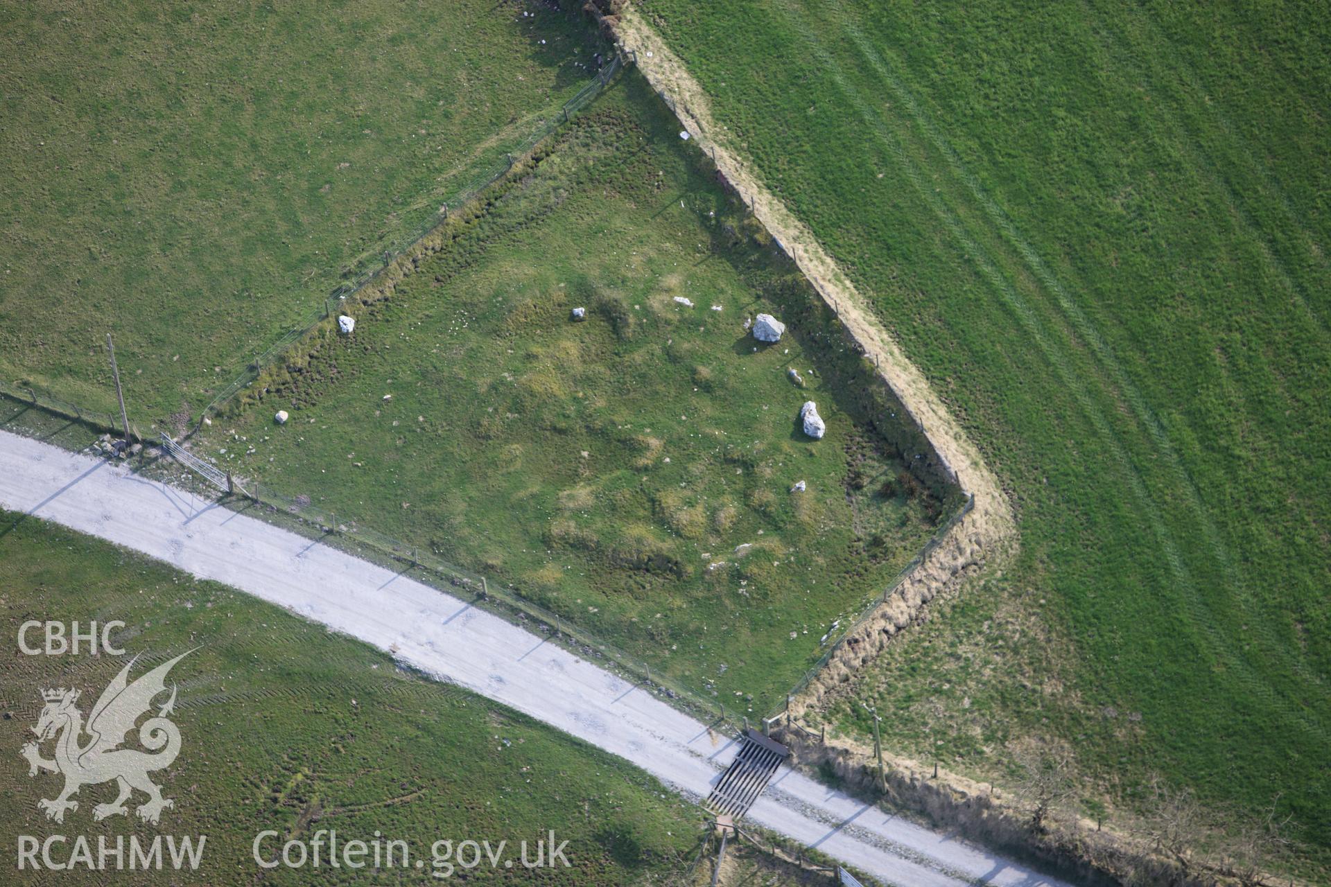 RCAHMW colour oblique aerial photograph of Crug Gwyn. Taken on 13 April 2010 by Toby Driver