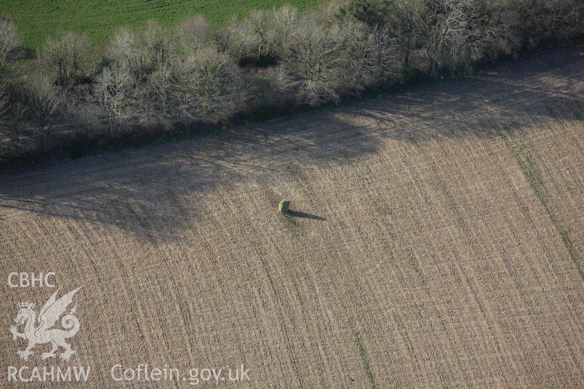 RCAHMW colour oblique aerial photograph of Ffosymaen Standing Stone, Llanpumsaint. Taken on 13 April 2010 by Toby Driver