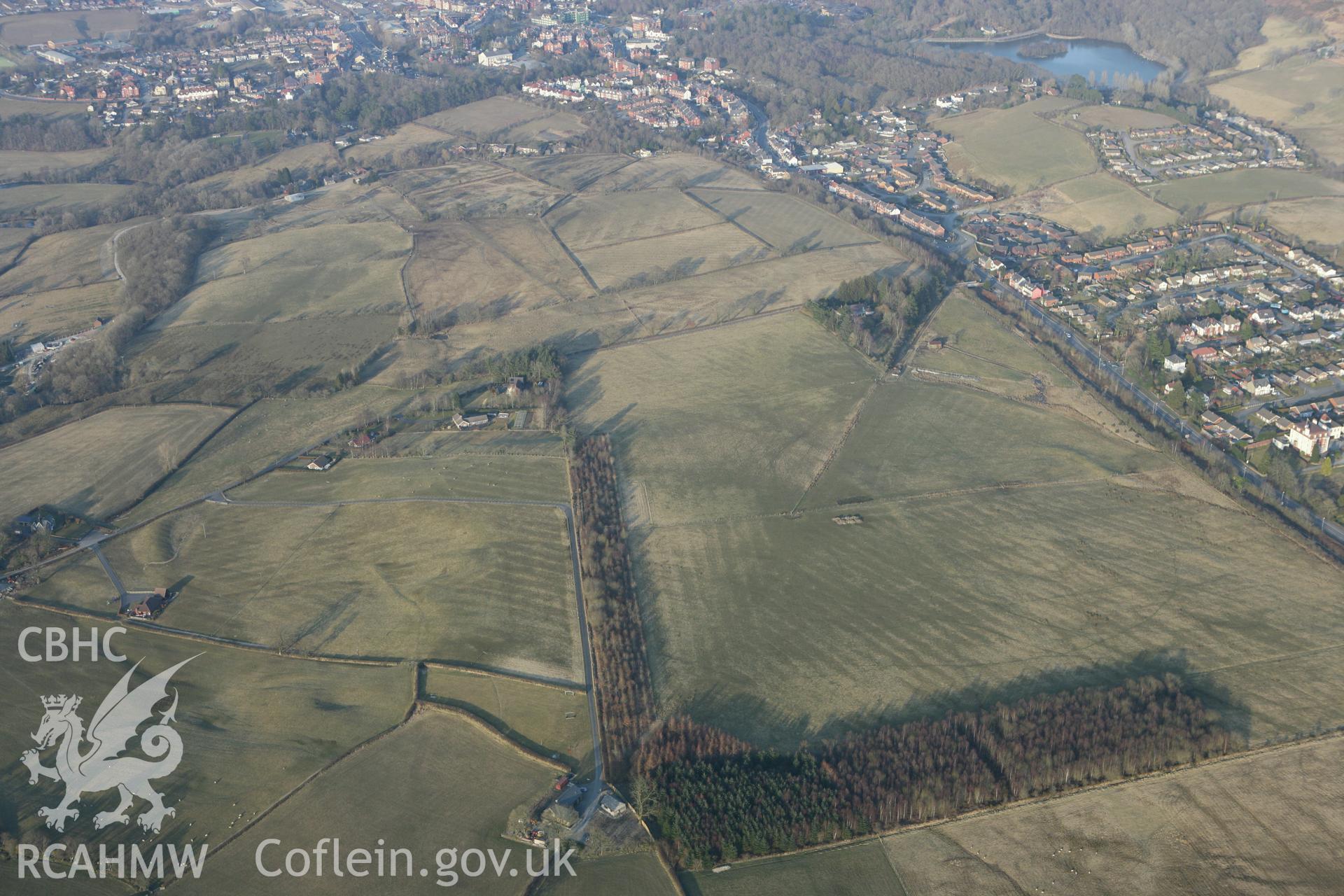 RCAHMW colour oblique photograph of Llandrindod Common Roman Practice Camps and Roman Road. Taken by Toby Driver on 11/03/2010.