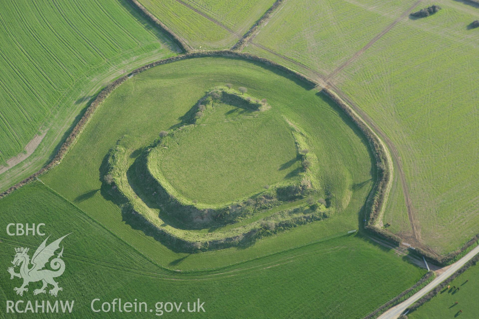 RCAHMW colour oblique aerial photograph of Romans Castle. Taken on 13 April 2010 by Toby Driver