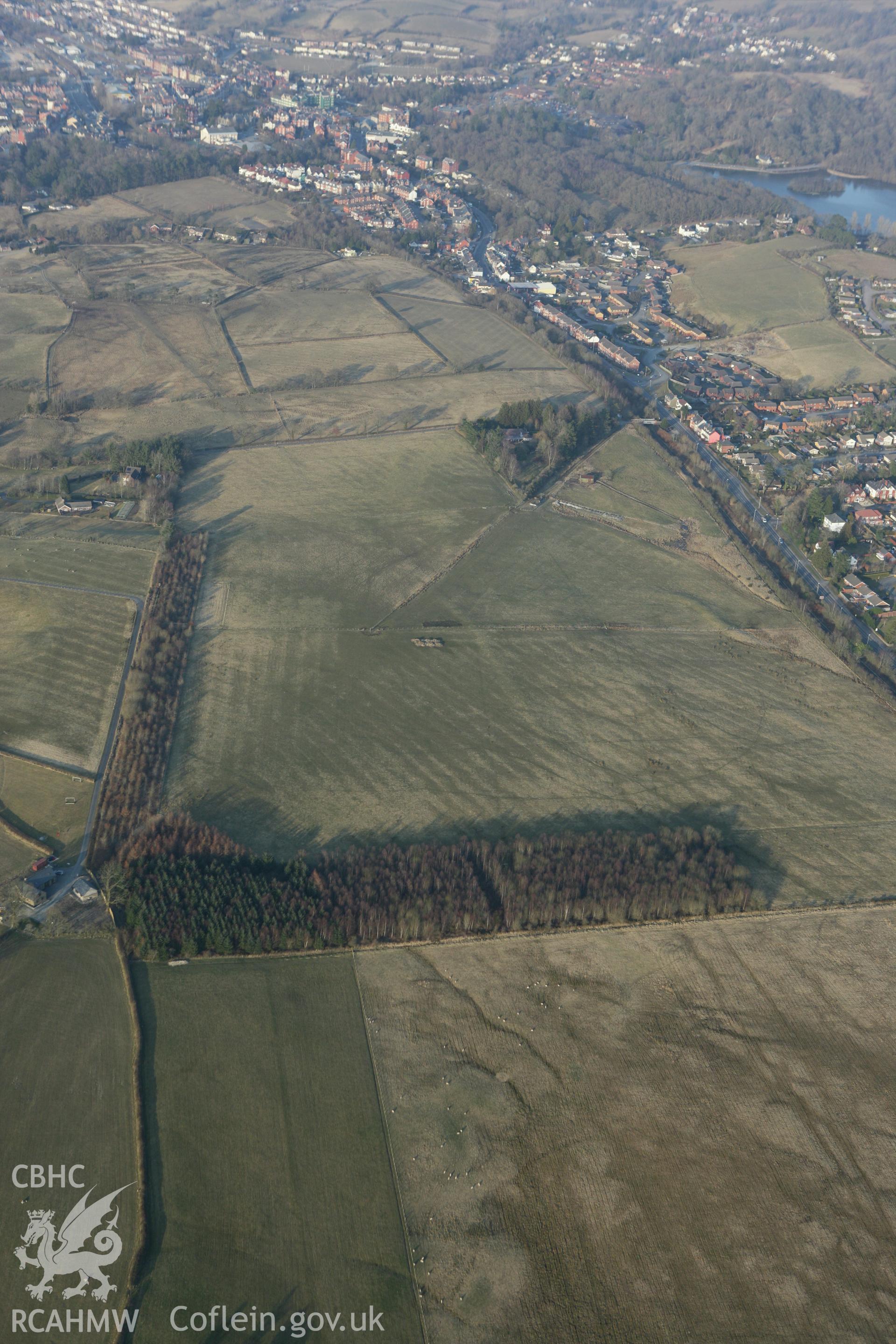 RCAHMW colour oblique photograph of Llandrindod Common Roman Practice Camps and Roman Road. Taken by Toby Driver on 11/03/2010.