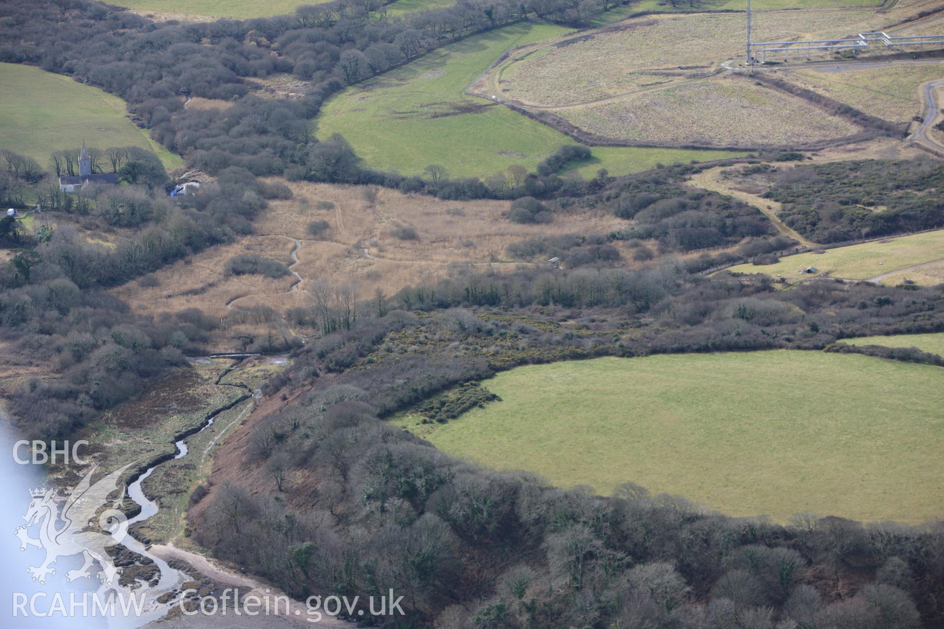 RCAHMW colour oblique aerial photograph of Lewiston Hill (Martins Haven) Enclosure. Taken on 02 March 2010 by Toby Driver