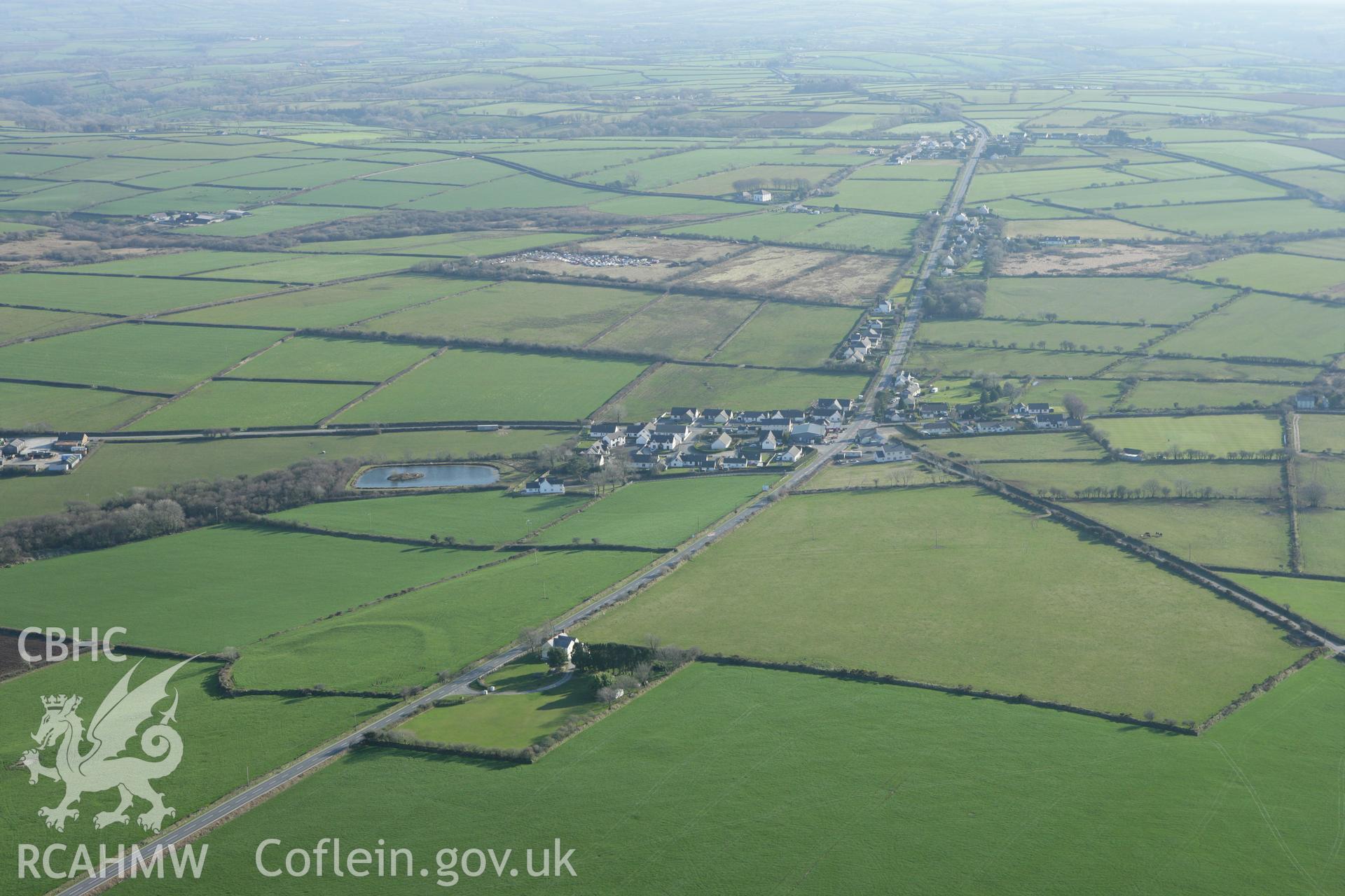 RCAHMW colour oblique aerial photograph of Castell Garw, Glandy Cross and surrounding landscape. Taken on 13 April 2010 by Toby Driver