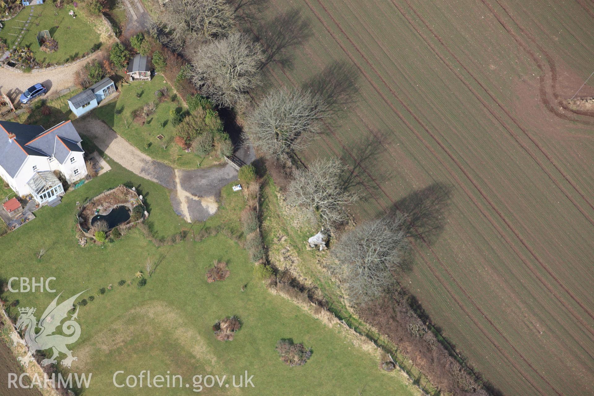 RCAHMW colour oblique aerial photograph of Hanging Stone Burial Chamber. Taken on 02 March 2010 by Toby Driver