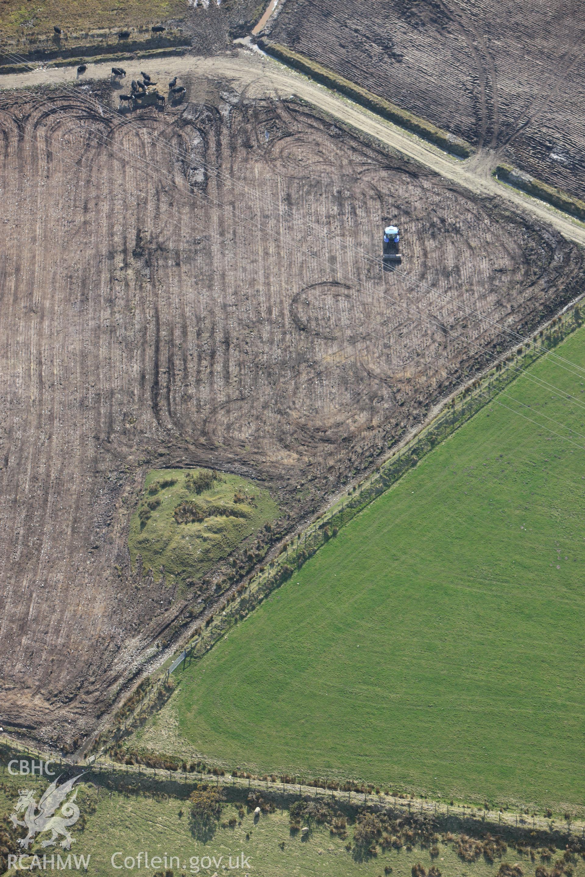 RCAHMW colour oblique aerial photograph of Cructarw with ploughing. Taken on 13 April 2010 by Toby Driver