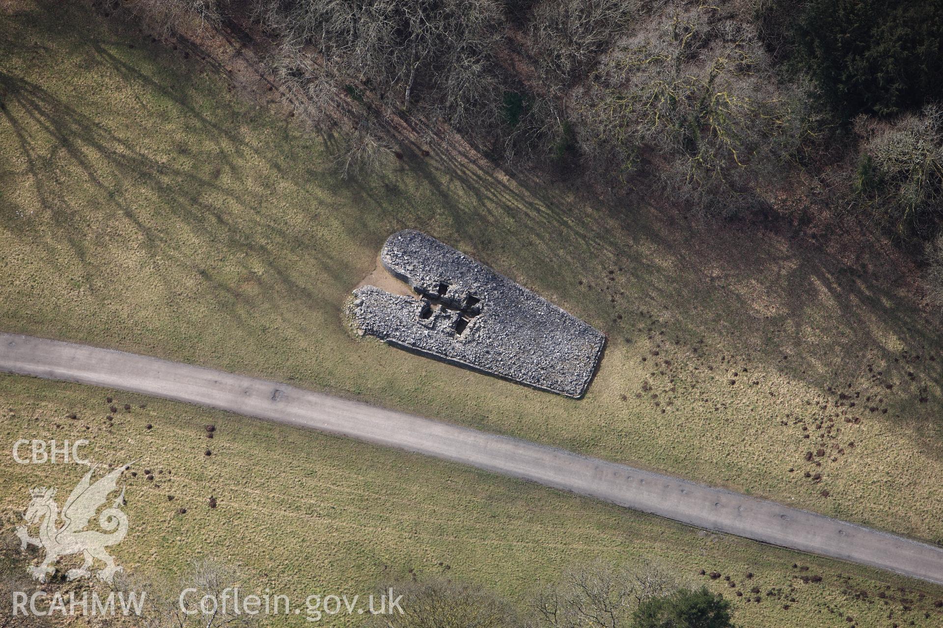 RCAHMW colour oblique photograph of Parc le Breos Burial Chamber;Parc Cwm Long Cairn. Taken by Toby Driver on 02/03/2010.