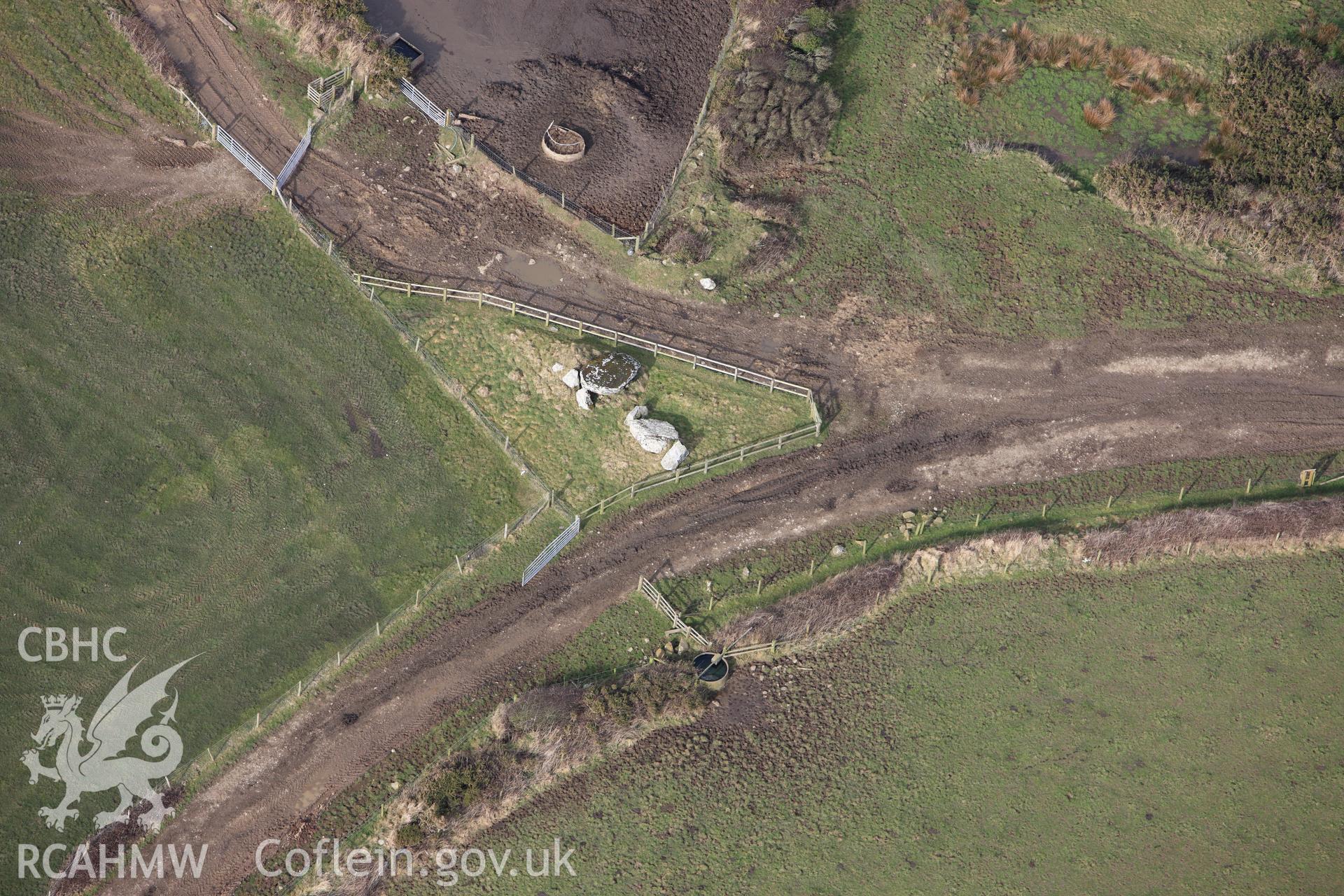 RCAHMW colour oblique aerial photograph of St Elvis Farm Burial Chambers. Taken on 02 March 2010 by Toby Driver