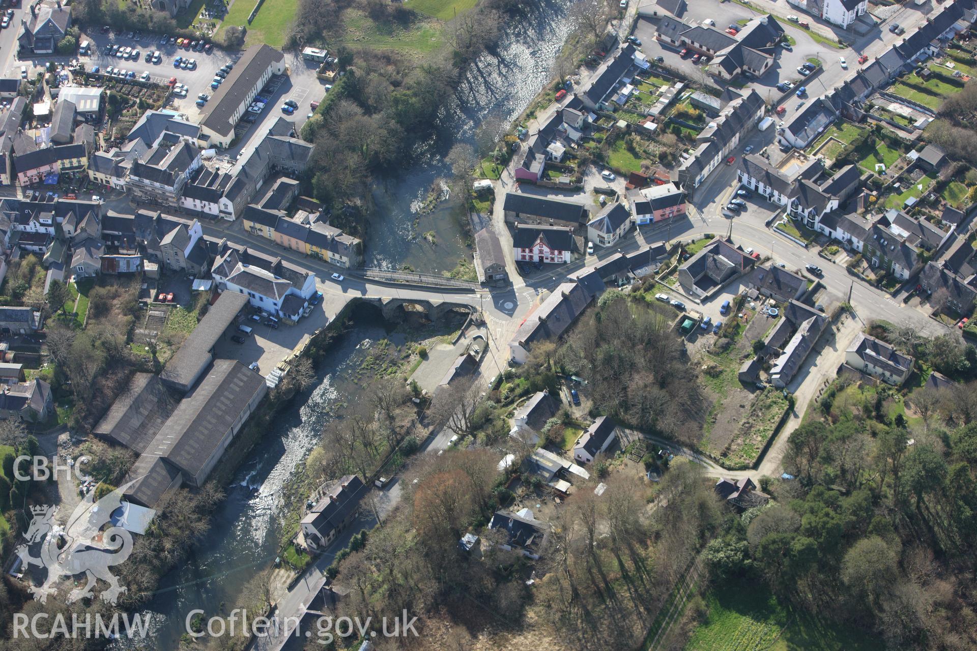 RCAHMW colour oblique aerial photograph of Newcastle Emlyn Bridge. Taken on 13 April 2010 by Toby Driver