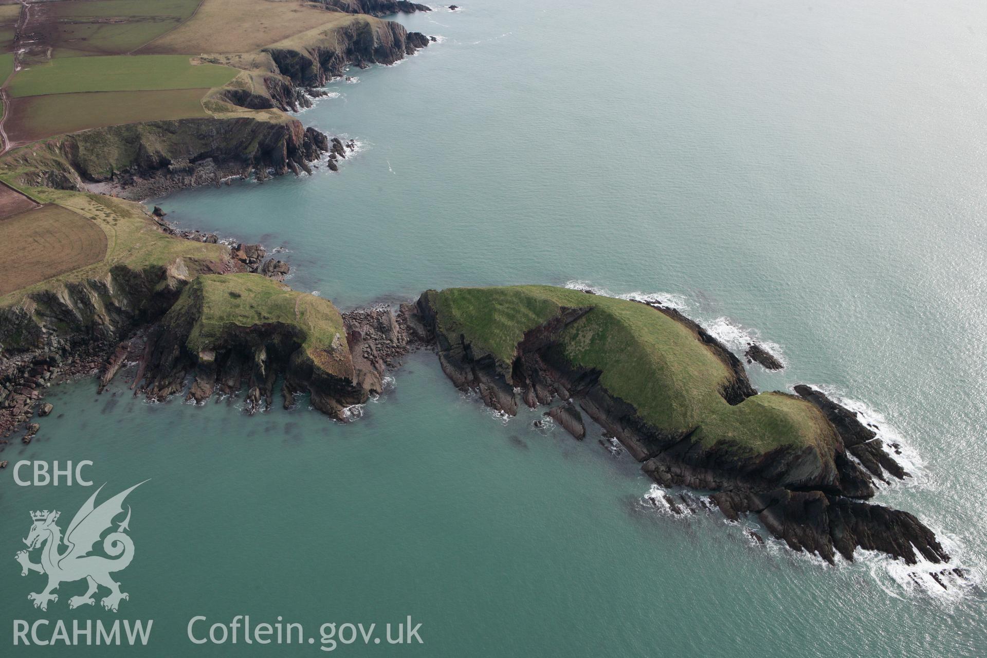 RCAHMW colour oblique aerial photograph of Sheep Island Promontory Fort. Taken on 02 March 2010 by Toby Driver