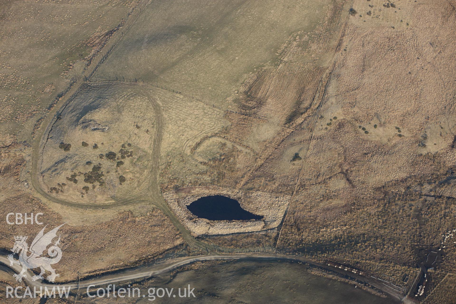 RCAHMW colour oblique photograph of Nant Brook Enclosure. Taken by Toby Driver on 11/03/2010.