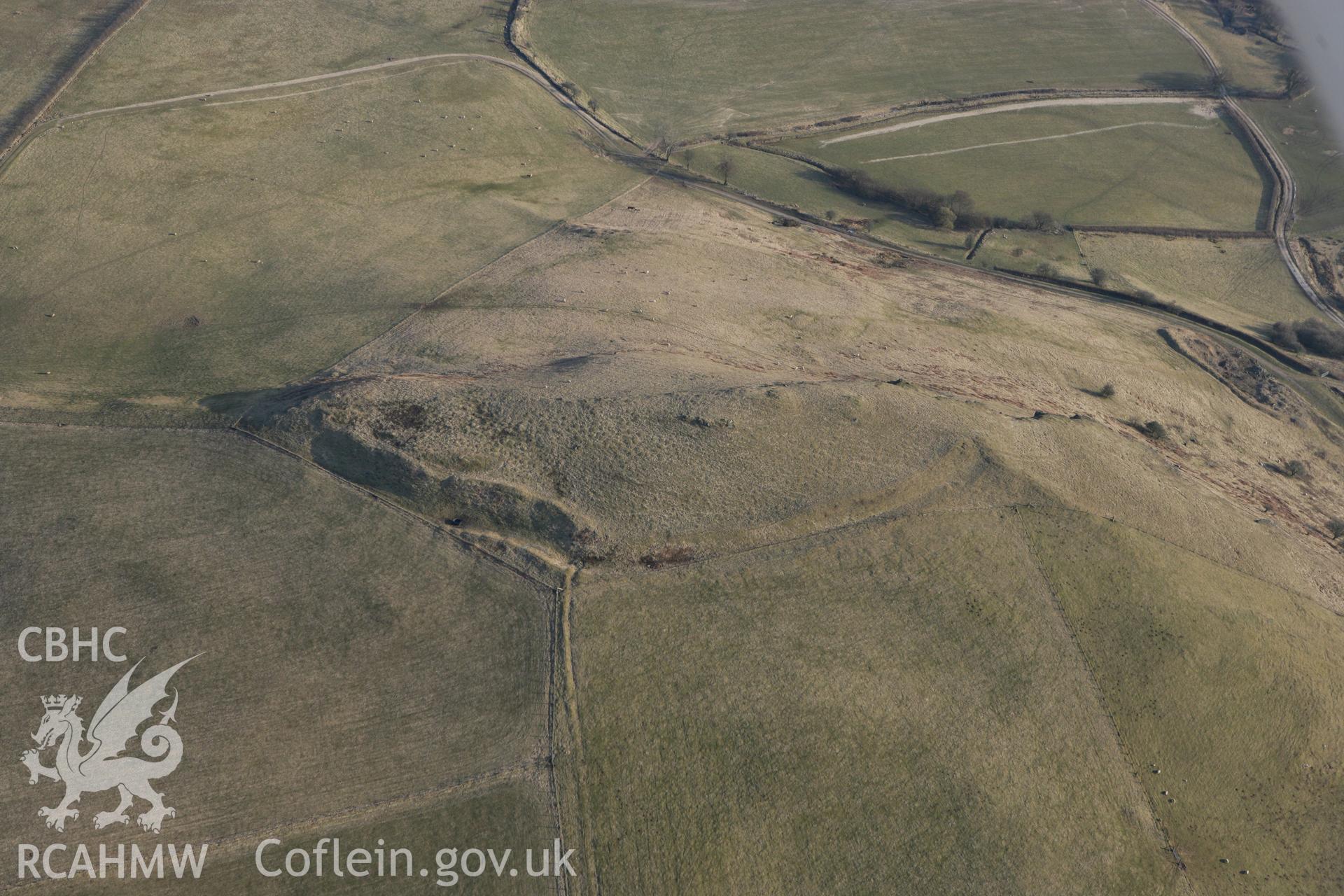 RCAHMW colour oblique photograph of Careg-wiber, defended enclosure. Taken by Toby Driver on 11/03/2010.