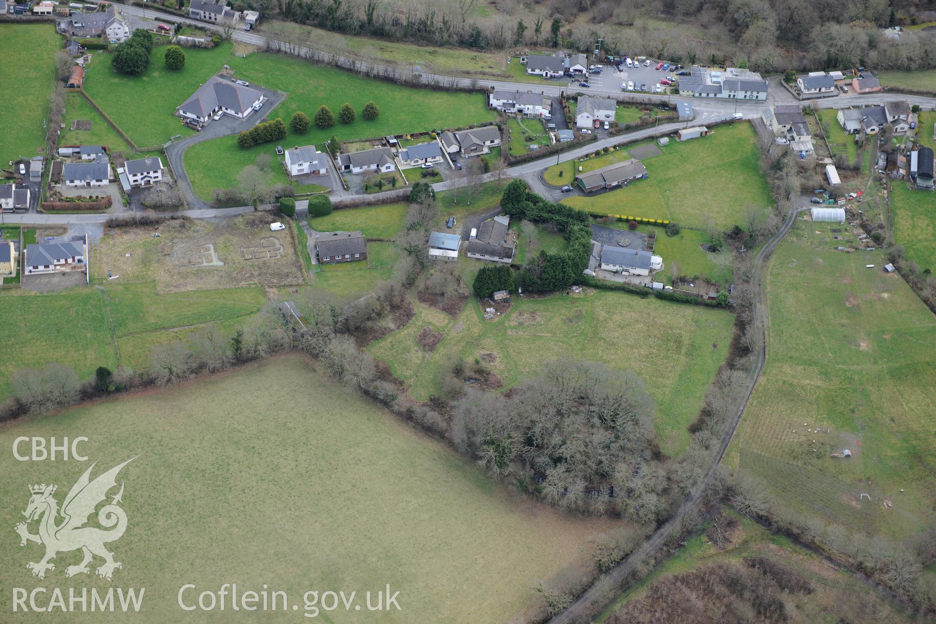 Castell Nant-y-Garan motte, Penrhiw-llan, between Newcastle Emlyn and Llandysul. Oblique aerial photograph taken during the Royal Commission's programme of archaeological aerial reconnaissance by Toby Driver on 13th March 2015.