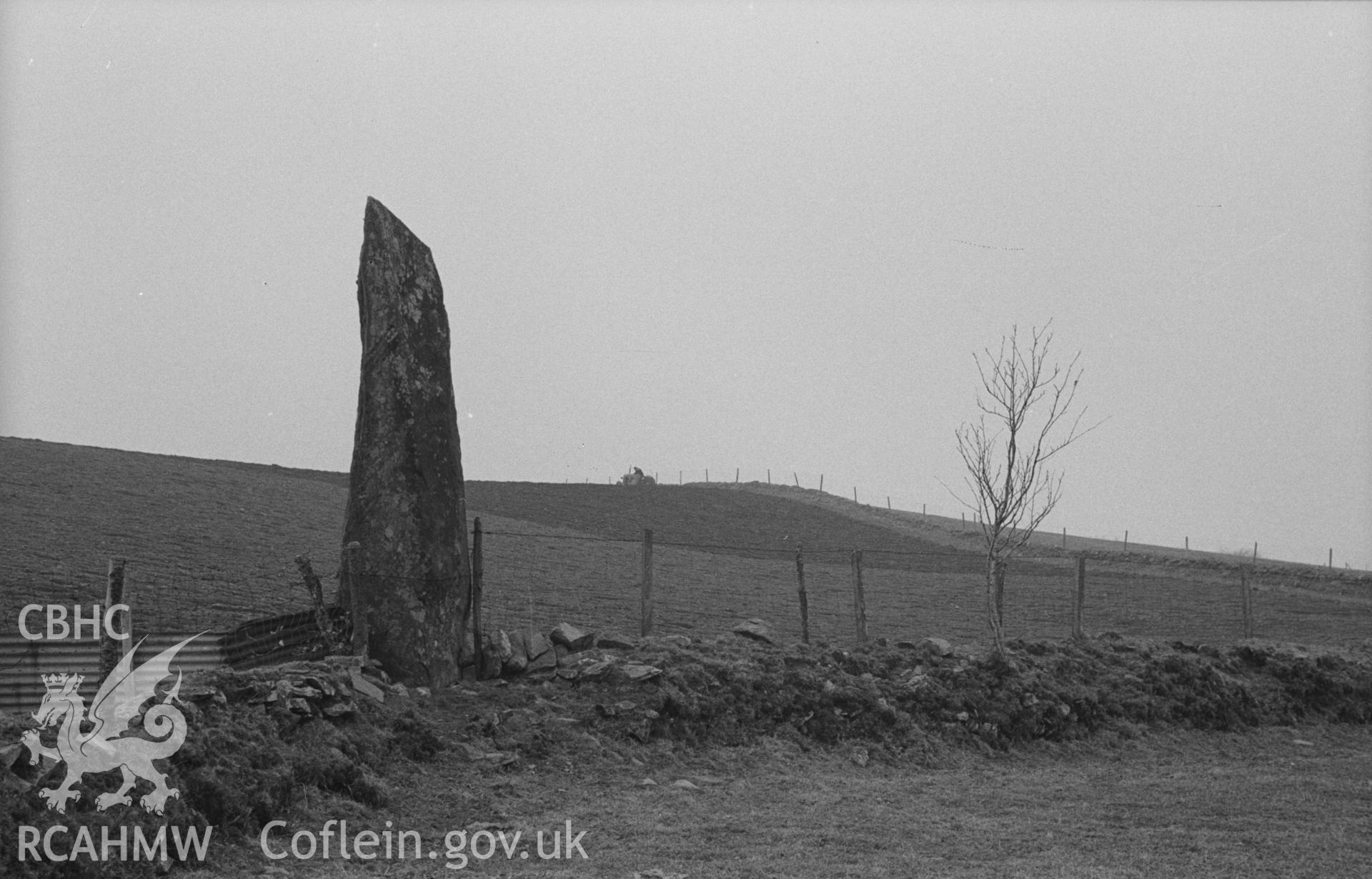 Digital copy of a black and white negative showing Carreg Hirfaen, Llanycrwys, defining the border between Ceredigion and Carmarthenshire. Photographed in April 1963 by Arthur O. Chater from Grid Reference SN 6246 4644, looking north.