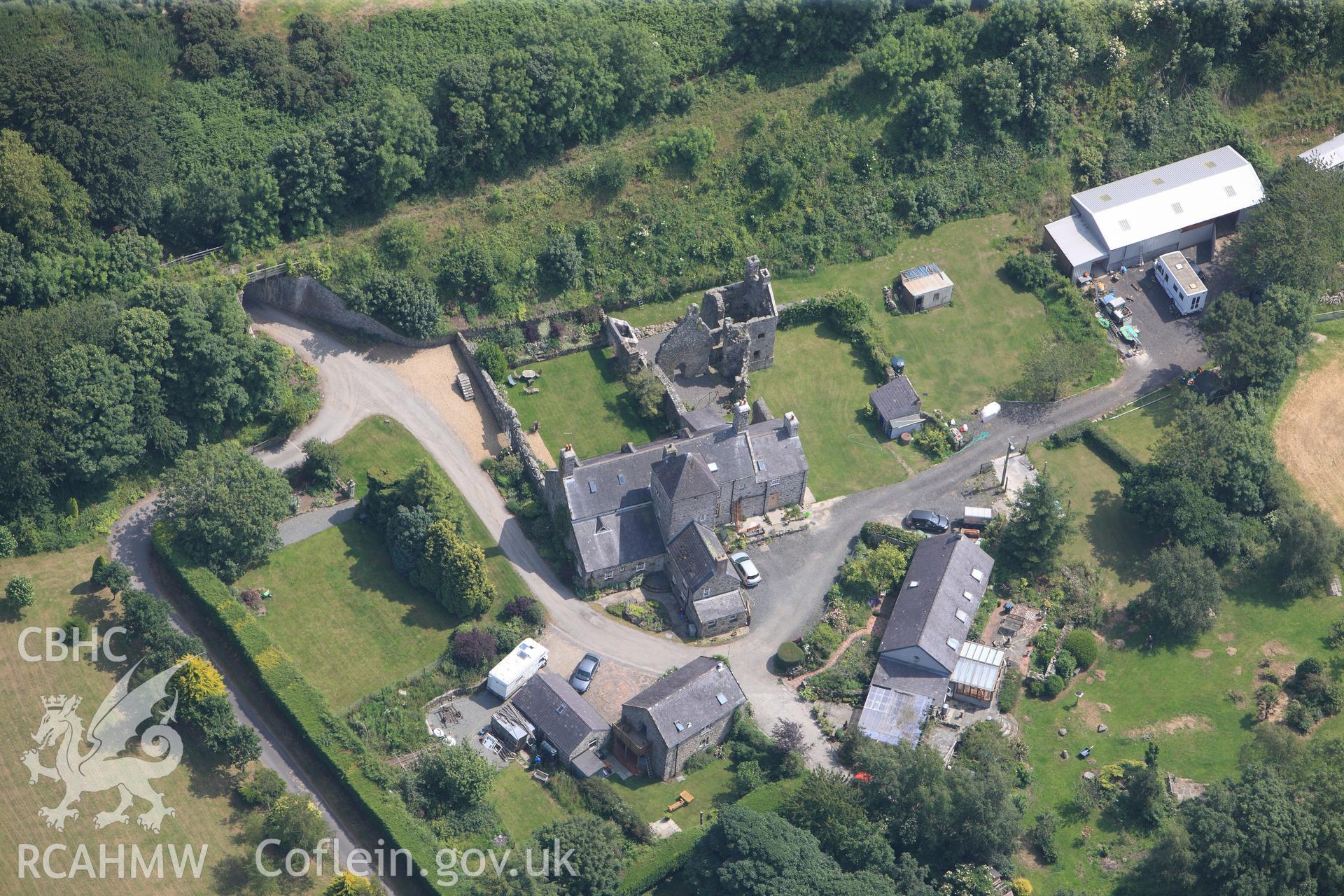 Plas Berw and its Coach House, Gaerwen, west of Llanfair PG, Anglesey. Oblique aerial photograph taken during the Royal Commission?s programme of archaeological aerial reconnaissance by Toby Driver on 12th July 2013.