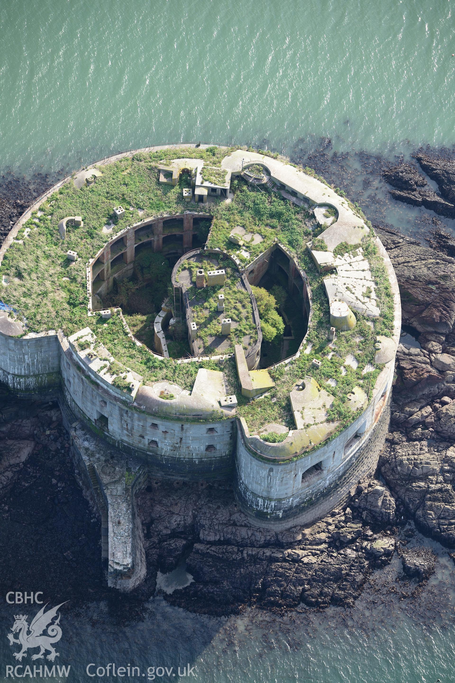 Stack Rock Fort, Milford Haven. Oblique aerial photograph taken during the Royal Commission's programme of archaeological aerial reconnaissance by Toby Driver on 30th September 2015.