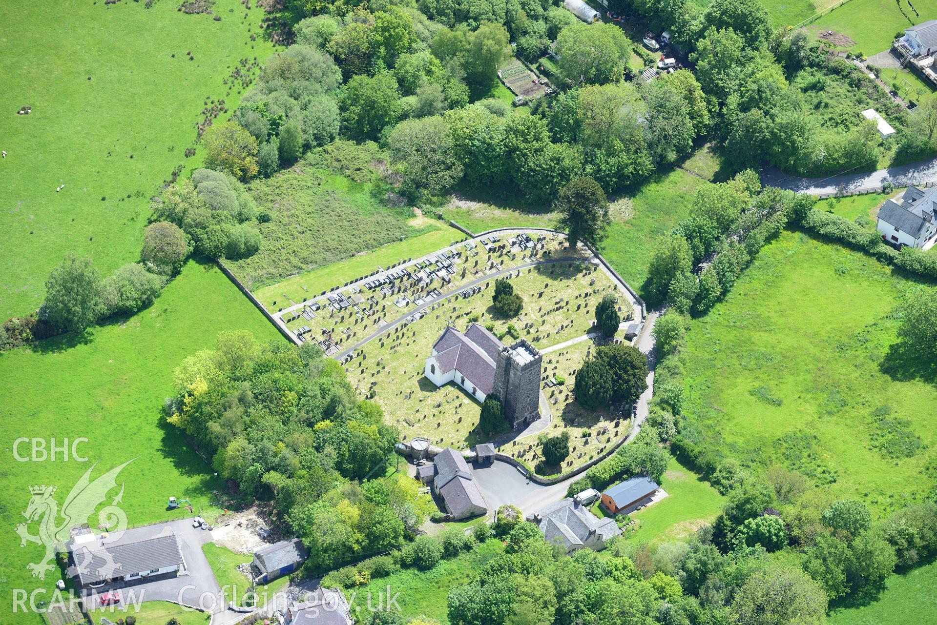 St. Gwenog's Church, Llanwenog. Oblique aerial photograph taken during the Royal Commission's programme of archaeological aerial reconnaissance by Toby Driver on 3rd June 2015.