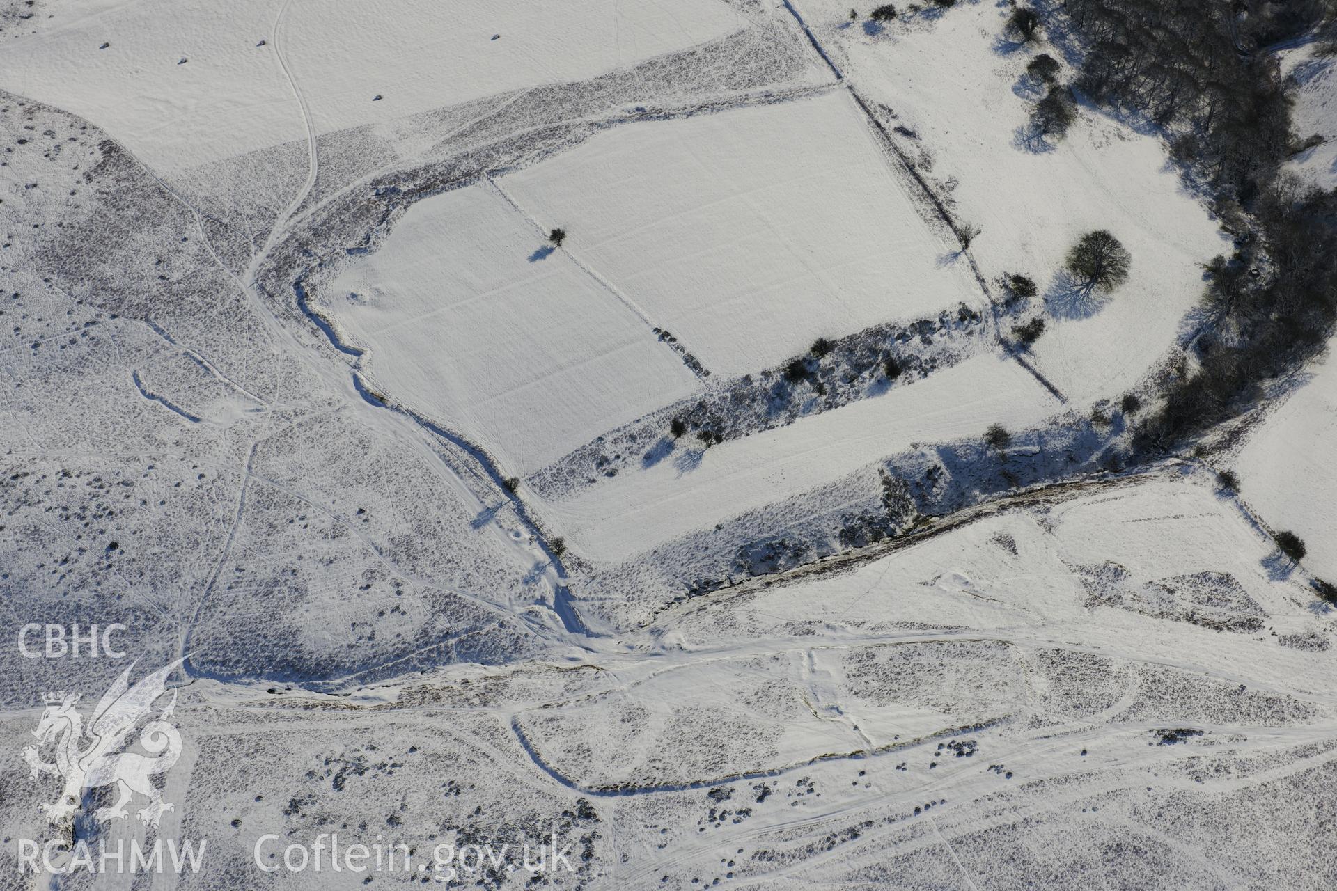 Deserted rural settlement on Aberedw Hill, east of Builth Wells. Oblique aerial photograph taken during the Royal Commission?s programme of archaeological aerial reconnaissance by Toby Driver on 15th January 2013.