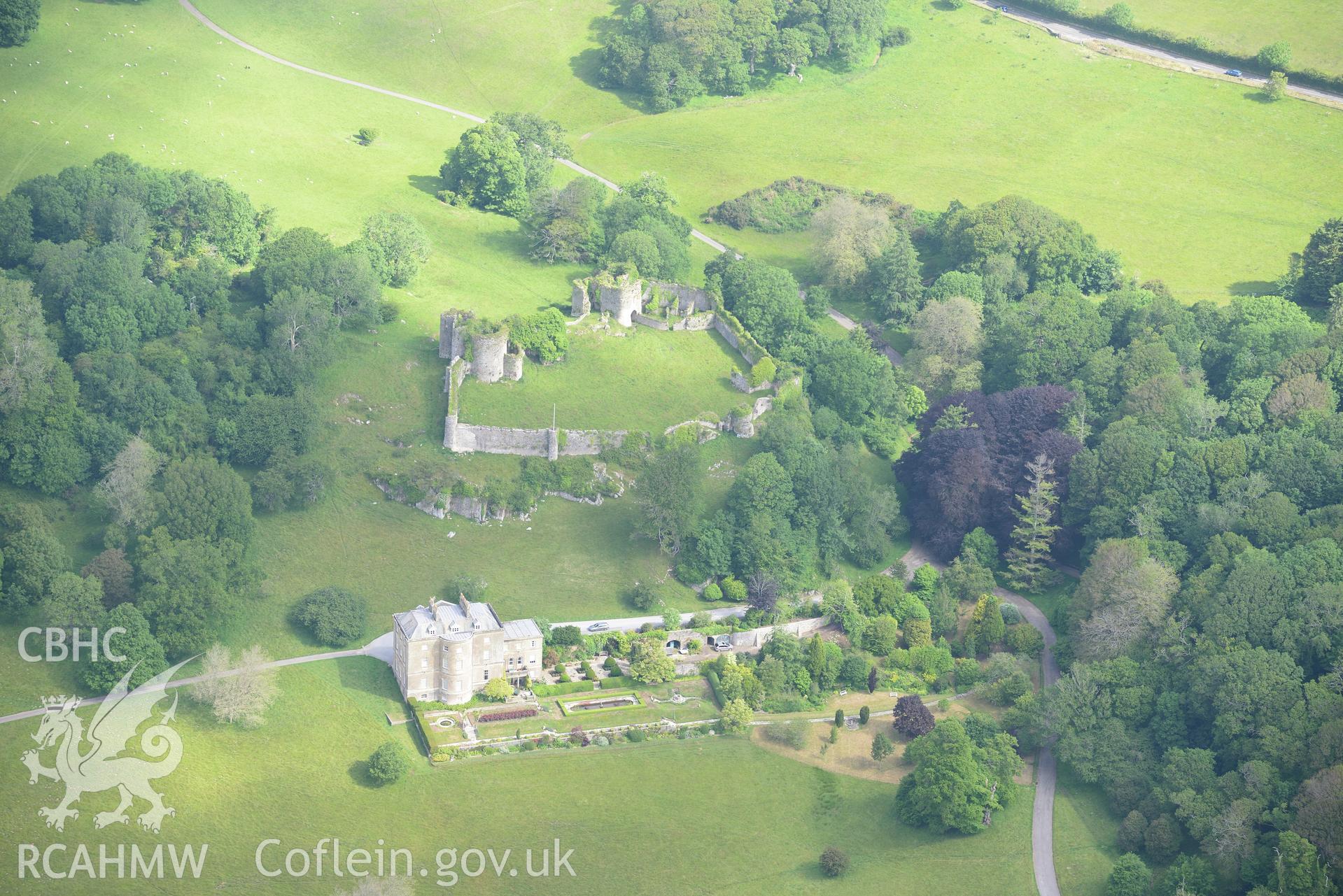 Penrice Castle, Mansion and Garden. Oblique aerial photograph taken during the Royal Commission's programme of archaeological aerial reconnaissance by Toby Driver on 19th June 2015.