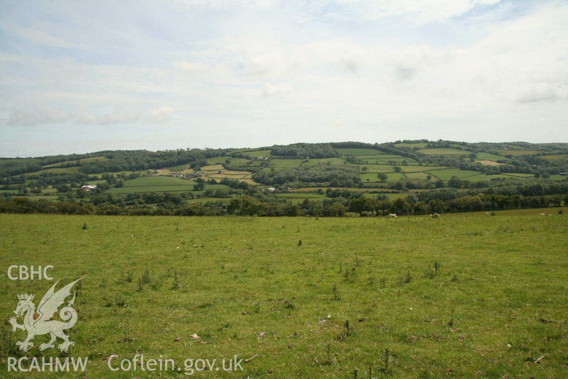 View from in front of enclosure at Castell Gaer looking south towards proposed site. Photographed as part of Archaeological Appraisal of Land at Llethrach Newydd, Llysonnen Road, Bancyfelin, Carmarthenshire, carried out by Archaeology Wales, 2015.