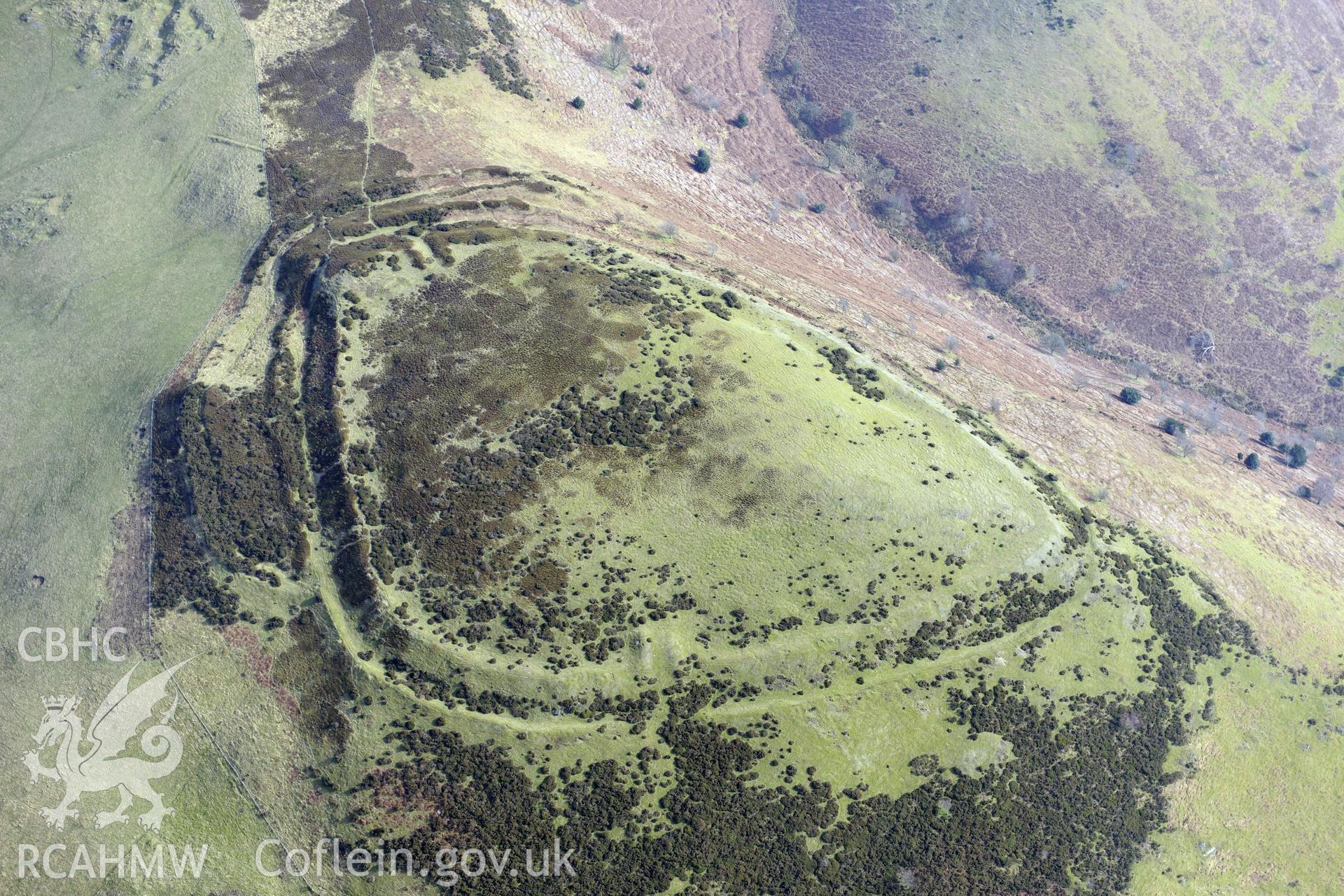 Moel-y-Gaer hillfort, Llanbedr, between Ruthin and Mold. Oblique aerial photograph taken during the Royal Commission?s programme of archaeological aerial reconnaissance by Toby Driver on 28th February 2013.