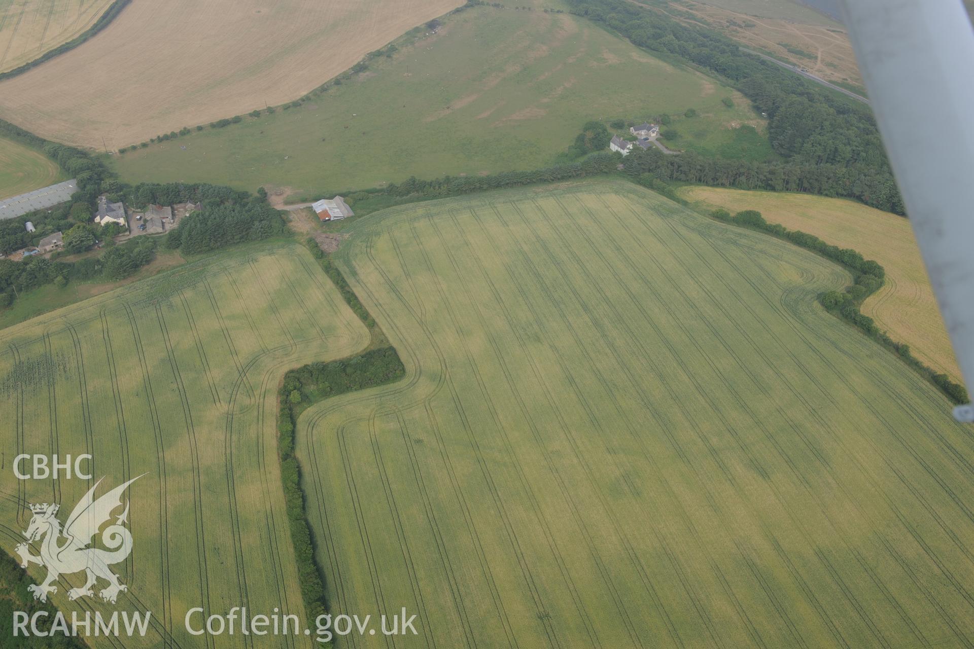 Royal Commission aerial photography of Norton causewayed enclosure cropmarks recorded during drought conditions on 22nd July 2013.