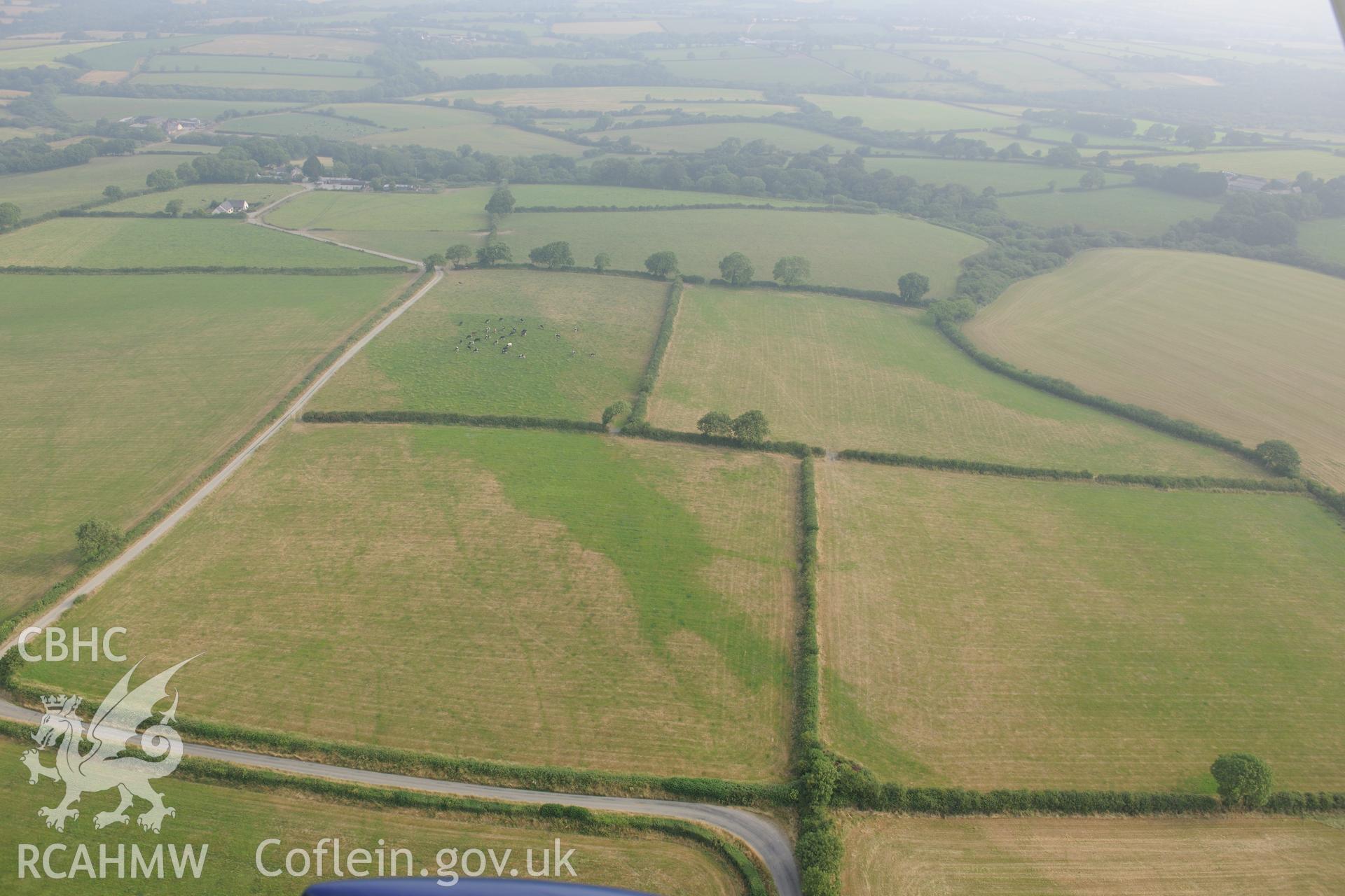 Royal Commission aerial photography of the possible Roman road line near West Dairy recorded during drought conditions on 22nd July 2013.