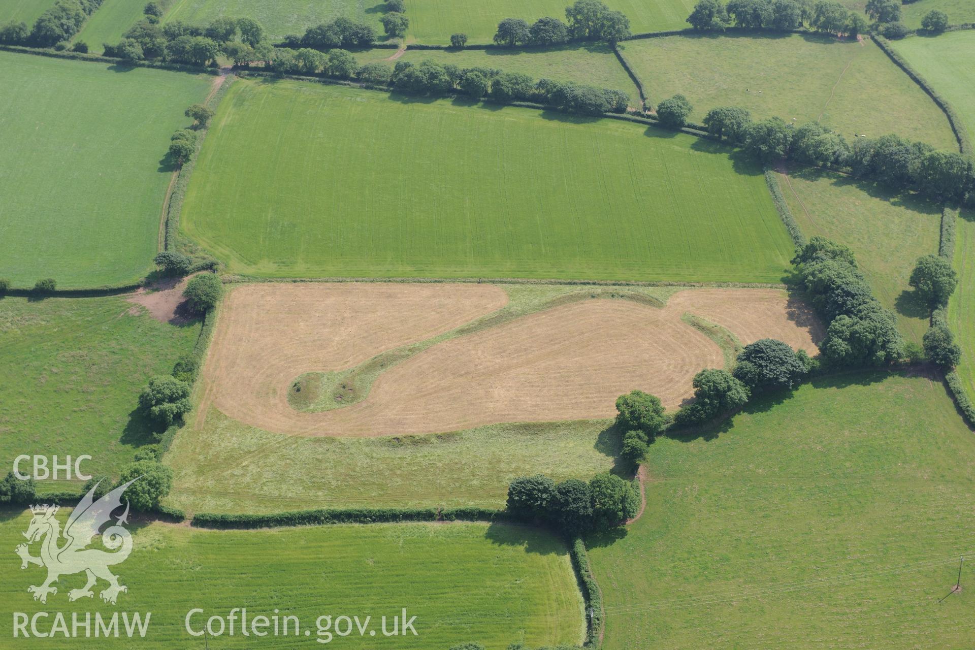 Molleston Back defended Enclosure, south west of Narberth. Oblique aerial photograph taken during the Royal Commission?s programme of archaeological aerial reconnaissance by Toby Driver on 16th July 2013.