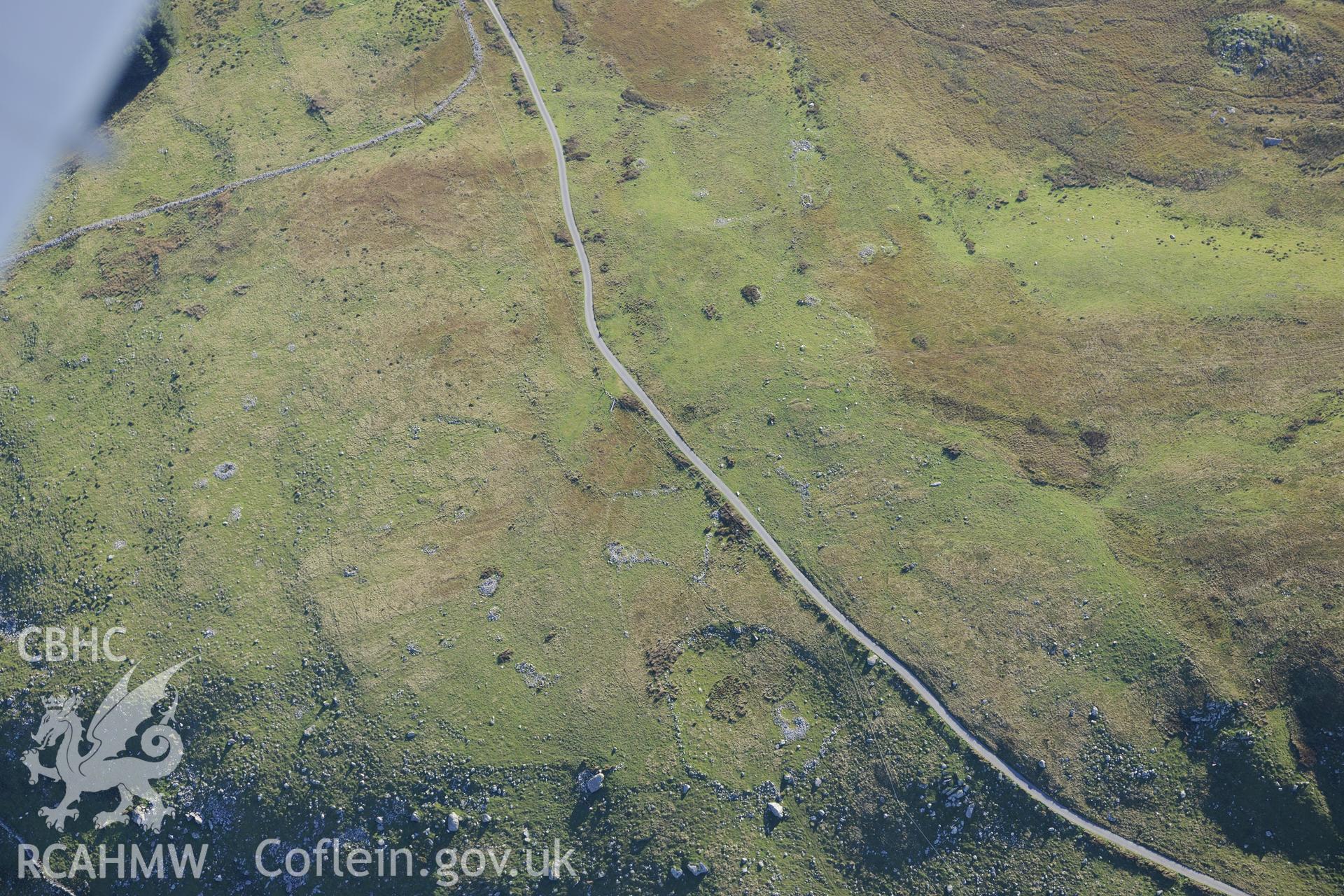 Bryn Seward settlement, south east of Fairbourne. Oblique aerial photograph taken during the Royal Commission's programme of archaeological aerial reconnaissance by Toby Driver on 2nd October 2015.