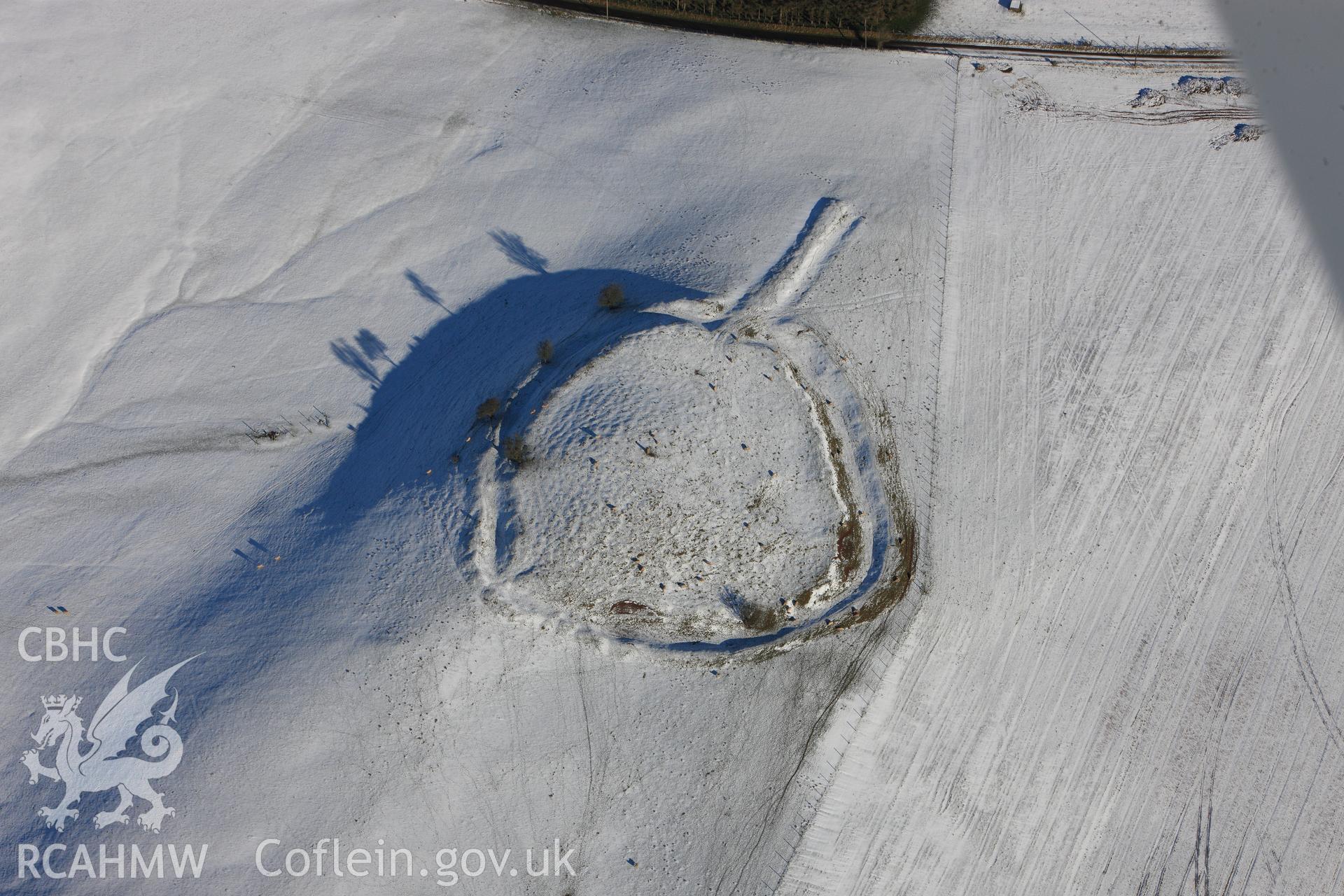 Twyn-y-Gaer defended enclosure. Oblique aerial photograph taken during the Royal Commission?s programme of archaeological aerial reconnaissance by Toby Driver on 15th January 2013.