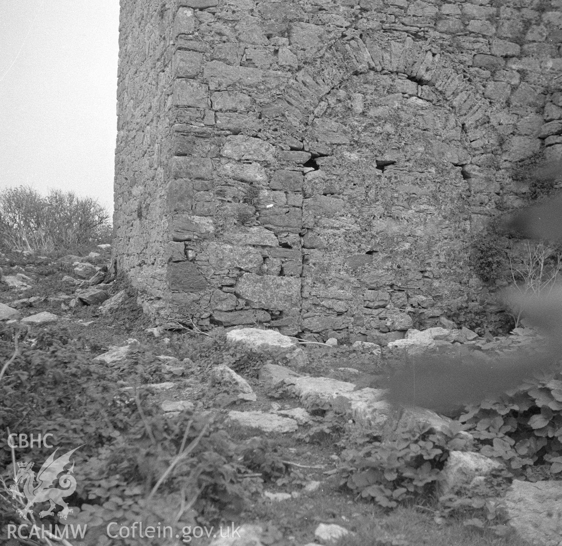 Digital copy of a black and white negative showing external view of bricked up archway entrance to Telegraph Building on Puffin Island