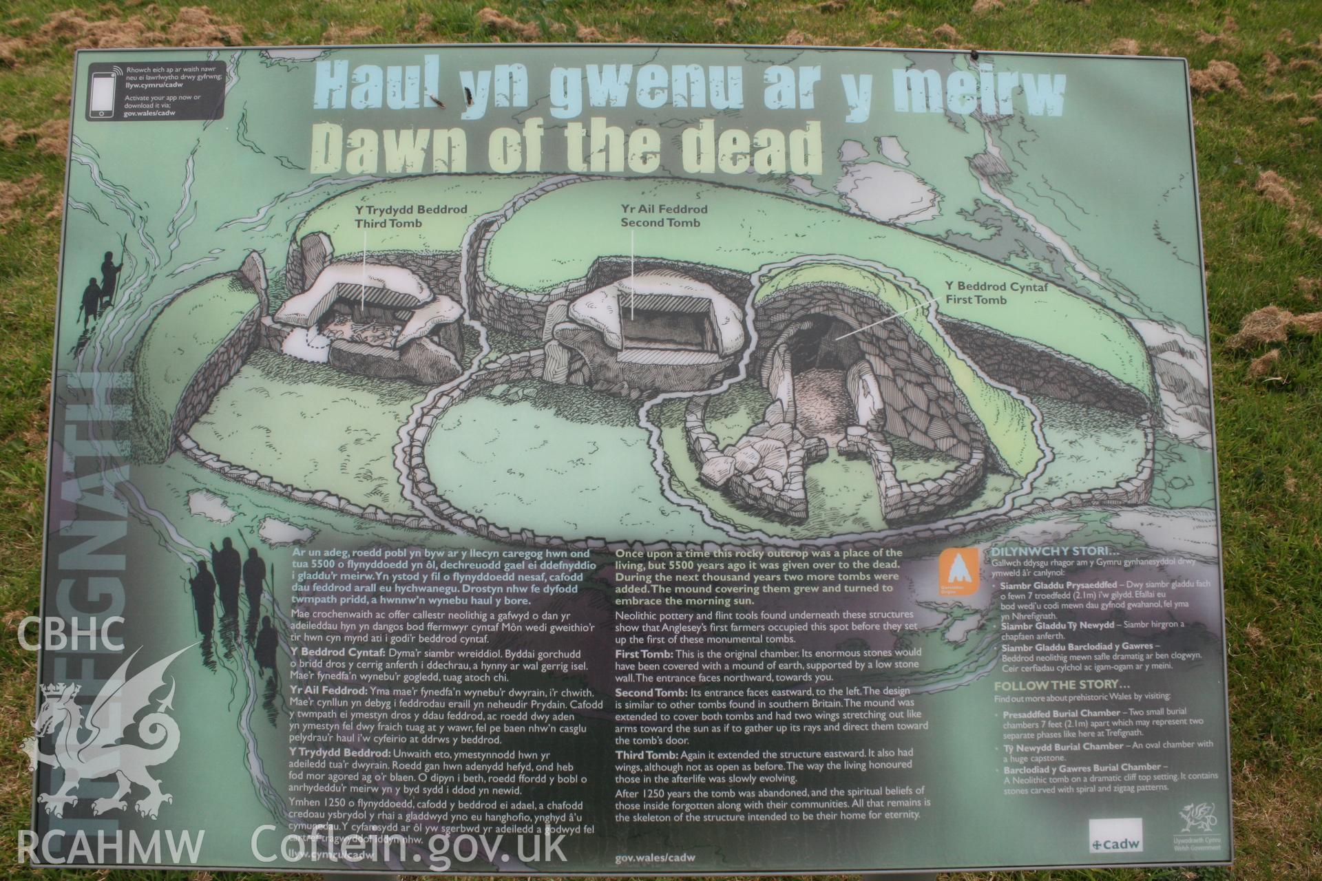 Information board about Trefignath burial chamber, produced by Cadw. Digital photograph taken as part of archaeological work at Parc Cybi Enterprise Zone, Holyhead, Anglesey, carried out by Archaeology Wales, 2017. Project number: P2522.