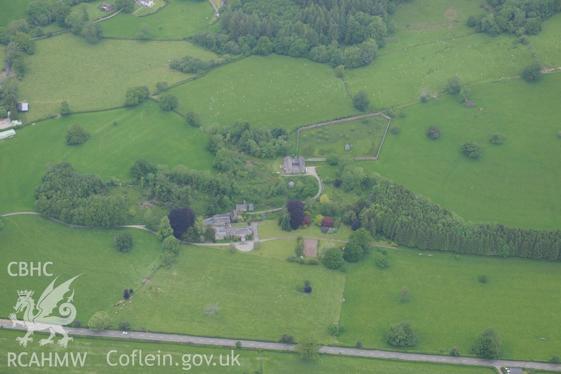 Llwyn-y-Brain house and garden, Llanwrda. Oblique aerial photograph taken during the Royal Commission's programme of archaeological aerial reconnaissance by Toby Driver on 11th June 2015.