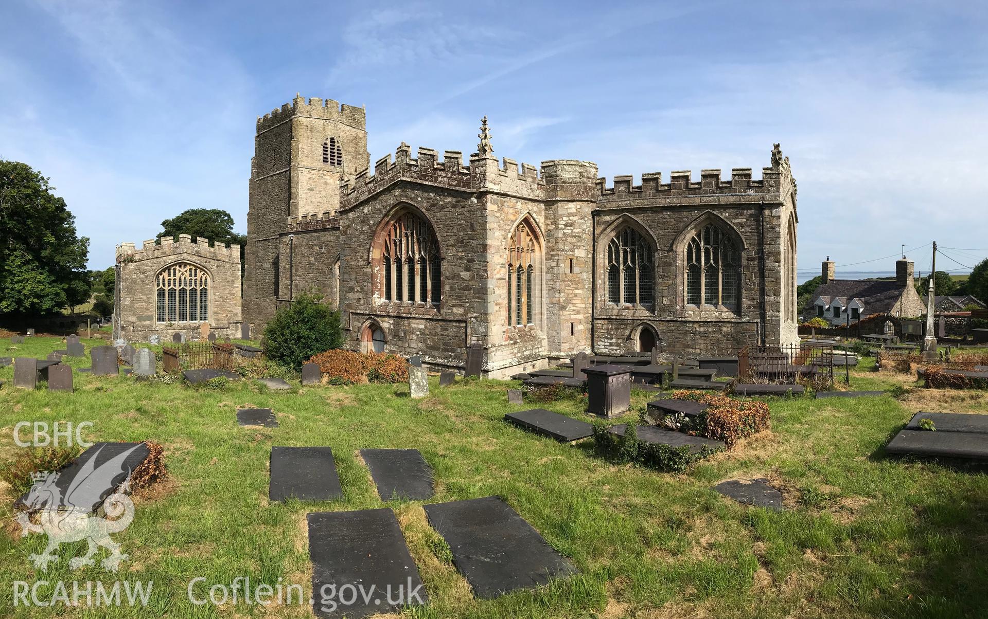 Colour photo showing external view of St. Bueno's Church and associated graveyard, Clynnog Fawr, taken by Paul R. Davis, 23rd June 2018.