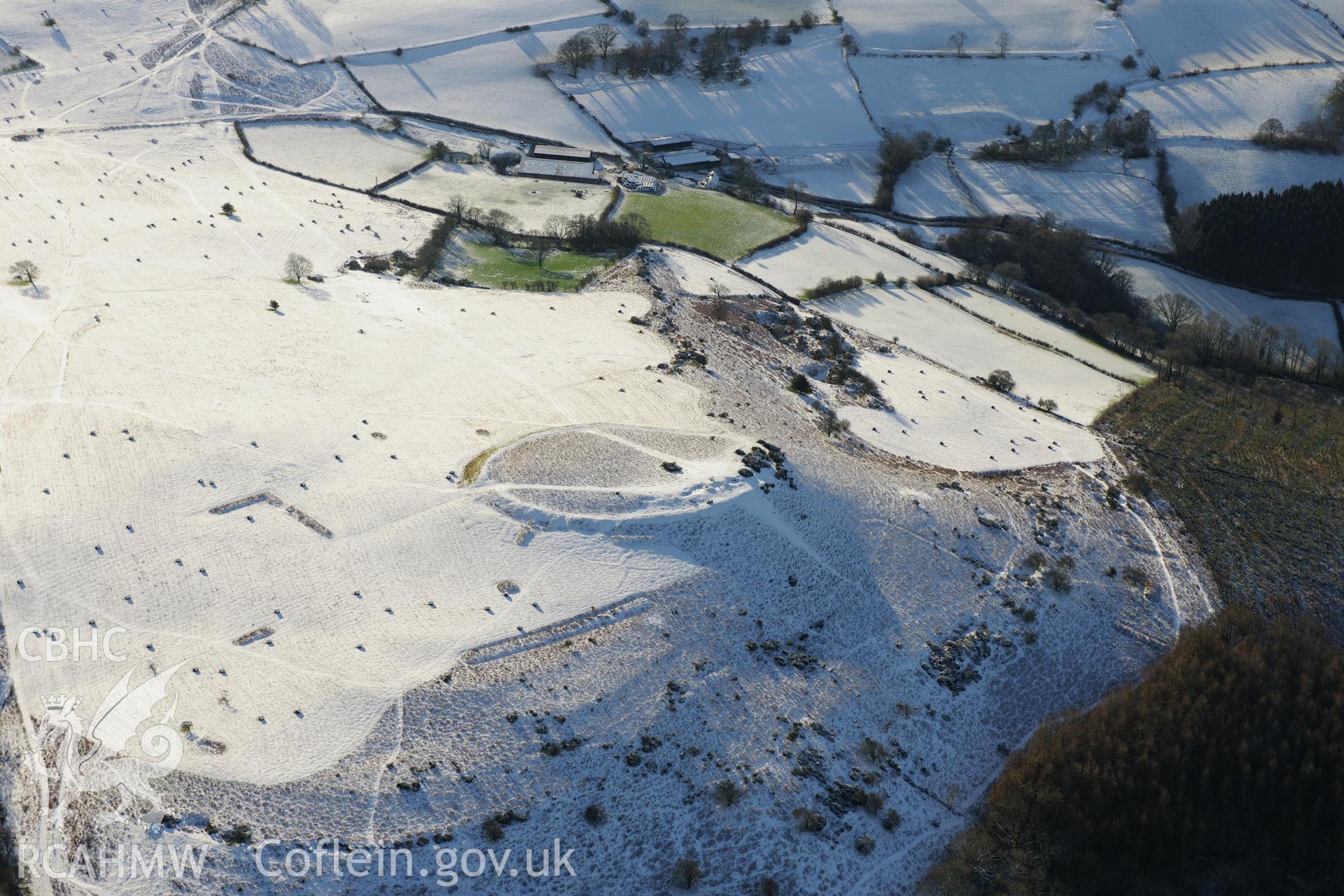 Twyn y Gaer hillfort and pillow mounds, west of Brecon. Oblique aerial photograph taken during the Royal Commission?s programme of archaeological aerial reconnaissance by Toby Driver on 15th January 2013.