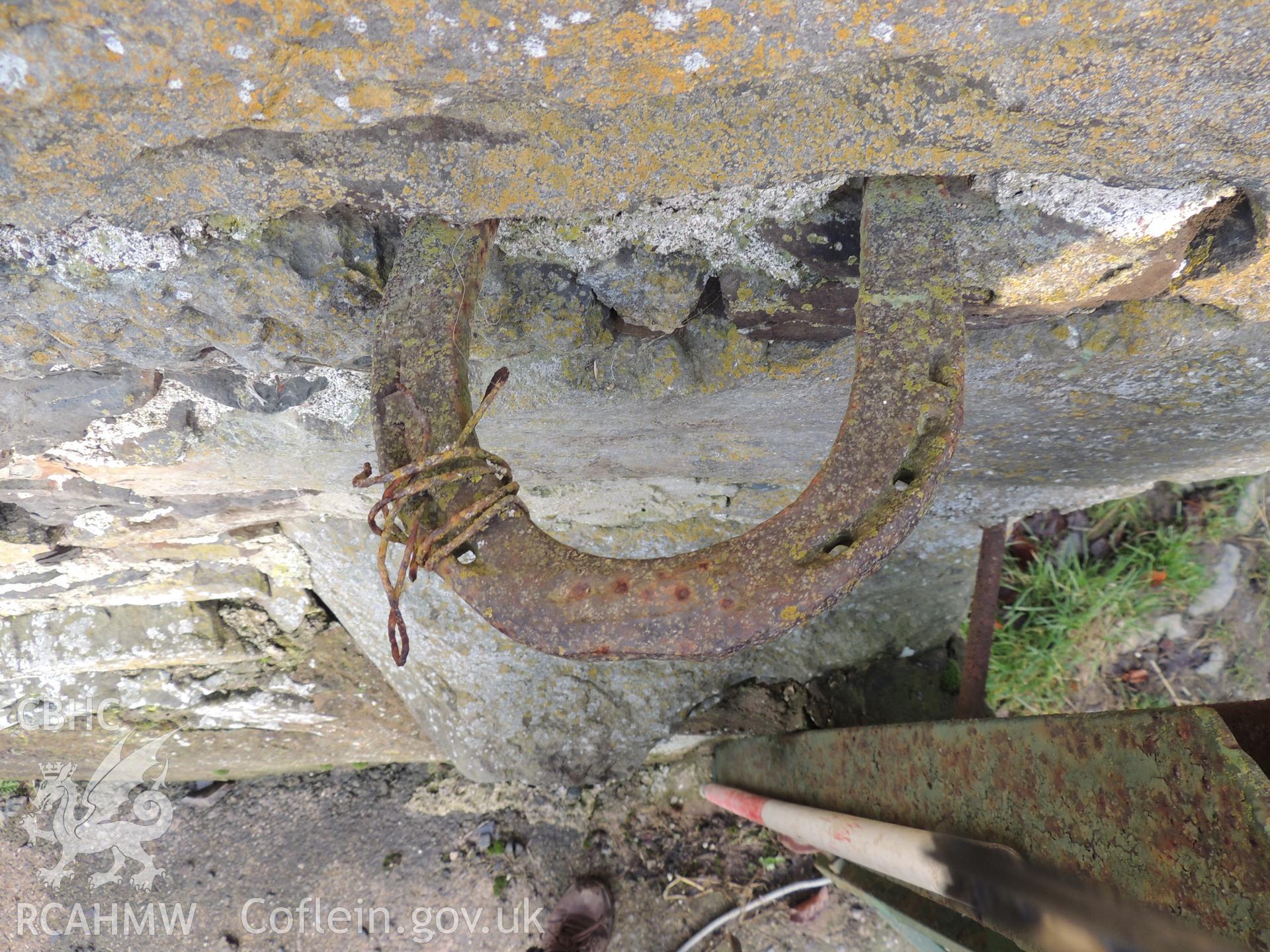 Horse shoe used to lock gate to the easternmost end of front elevation. Photograph taken for archaeological building survey at Bryn Gwylan Threshing Barn, Llangernyw, Conwy, carried out by Archaeology Wales, 2017-2018. Report no. 1640. Project no. 2578.