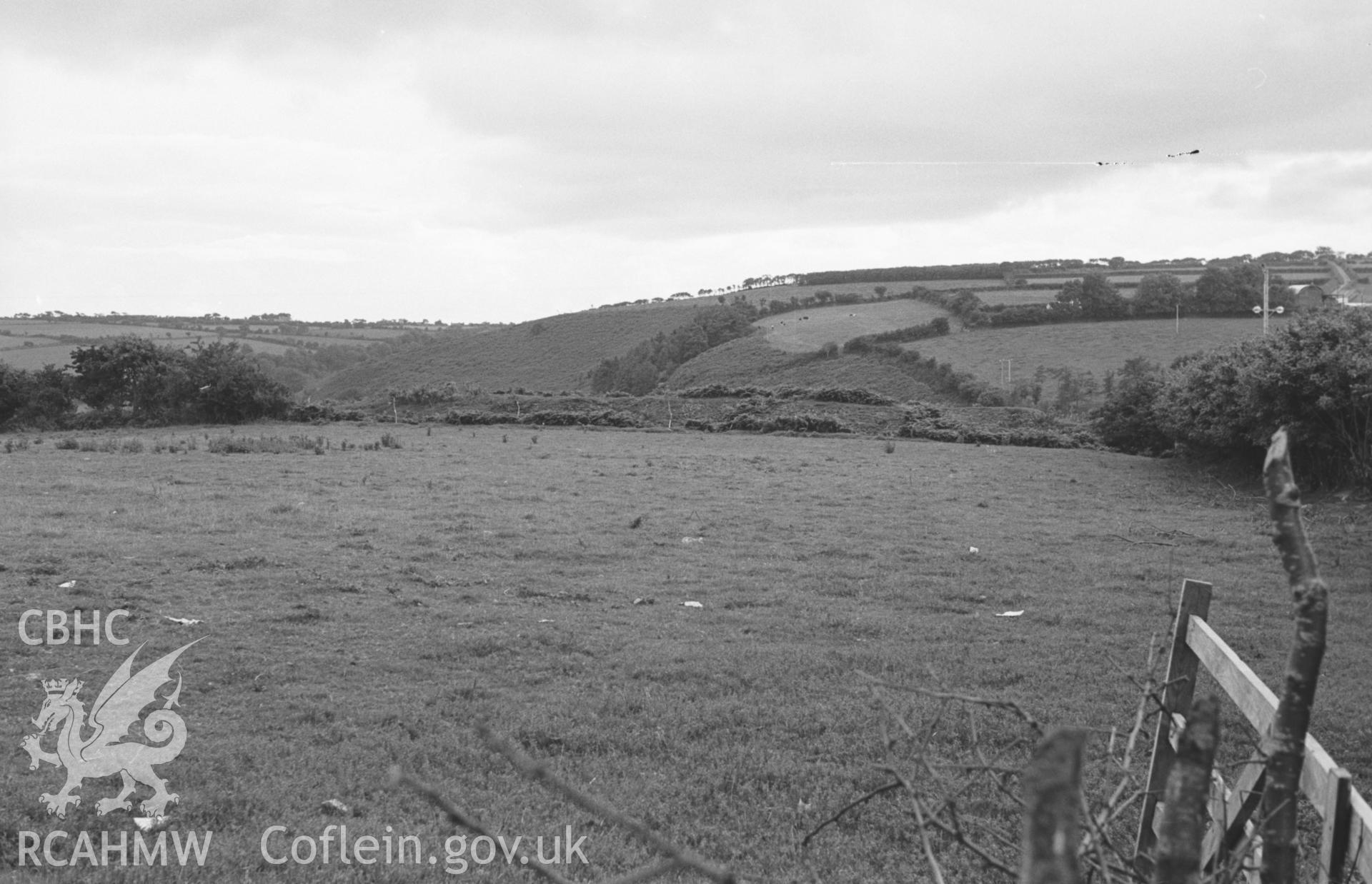 Digital copy of a black and white negative showing east rampart of iron age camp 1.3km south east of Brynhoffnant, by Blaen-Igau Farm. Photographed in August 1963 by Arthur O. Chater from Grid Reference SN 3428 5067, looking west south west.