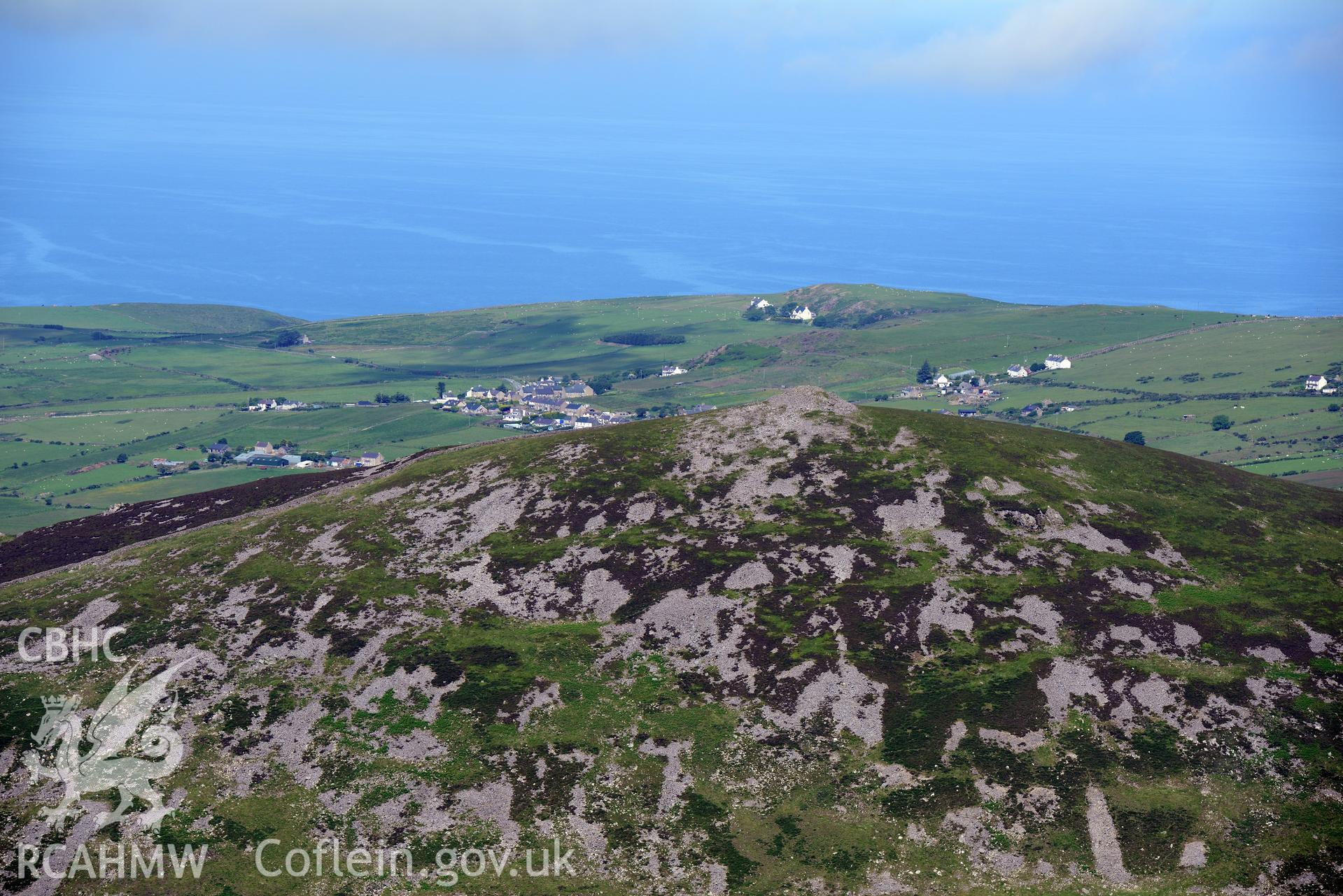 Carnguwch Cairn. Oblique aerial photograph taken during the Royal Commission's programme of archaeological aerial reconnaissance by Toby Driver on 23rd June 2015.