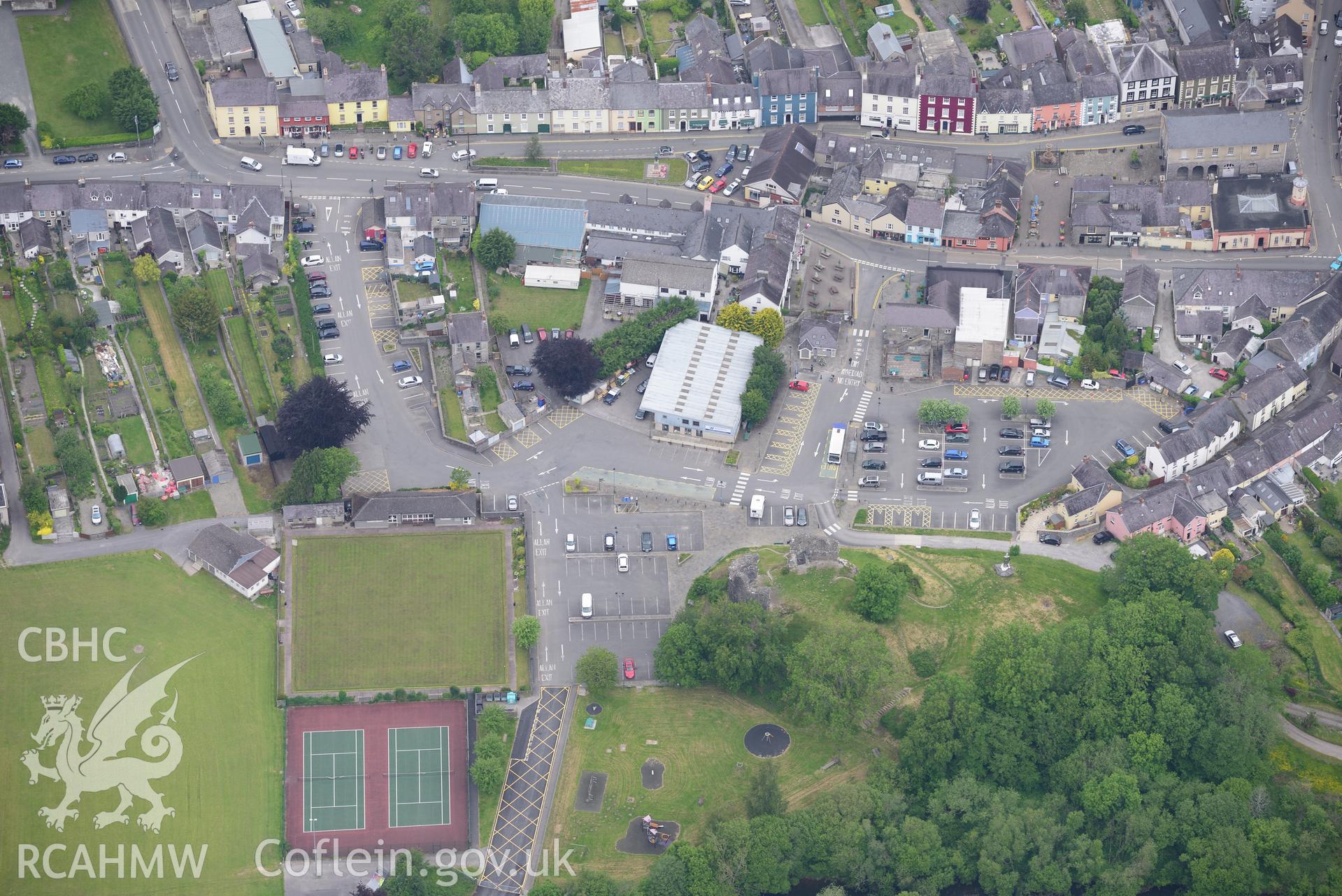 Llandovery town hall; old market hall; castle and castle sports ground. Oblique aerial photograph taken during the Royal Commission's programme of archaeological aerial reconnaissance by Toby Driver on 11th June 2015.