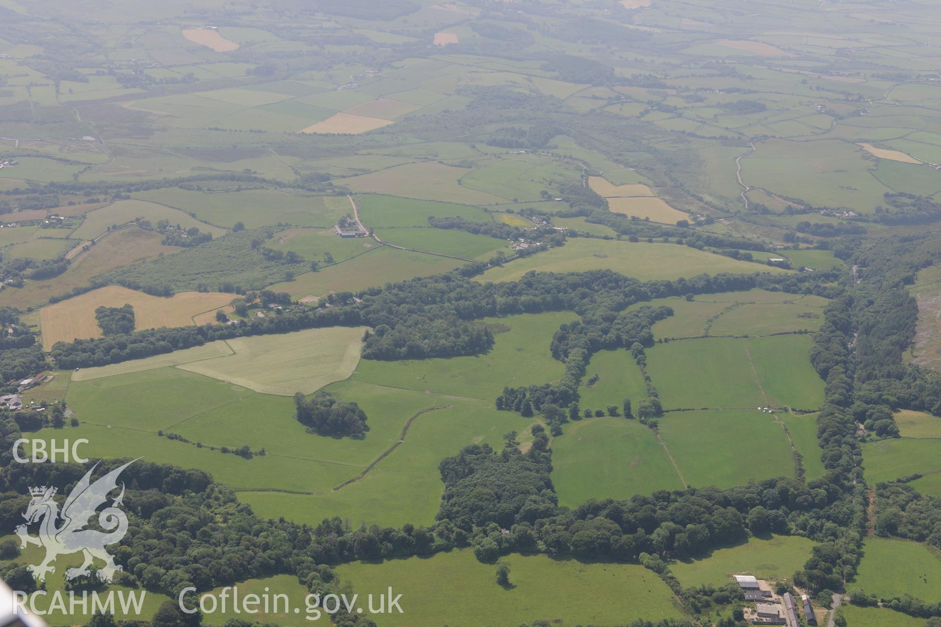 Park, Grounds and Gardens of Bodfean Hall in the middle of the Lleyn Peninsula, viewed from the north east. Oblique aerial photograph taken during the Royal Commission?s programme of archaeological aerial reconnaissance by Toby Driver on 12th July 2013.