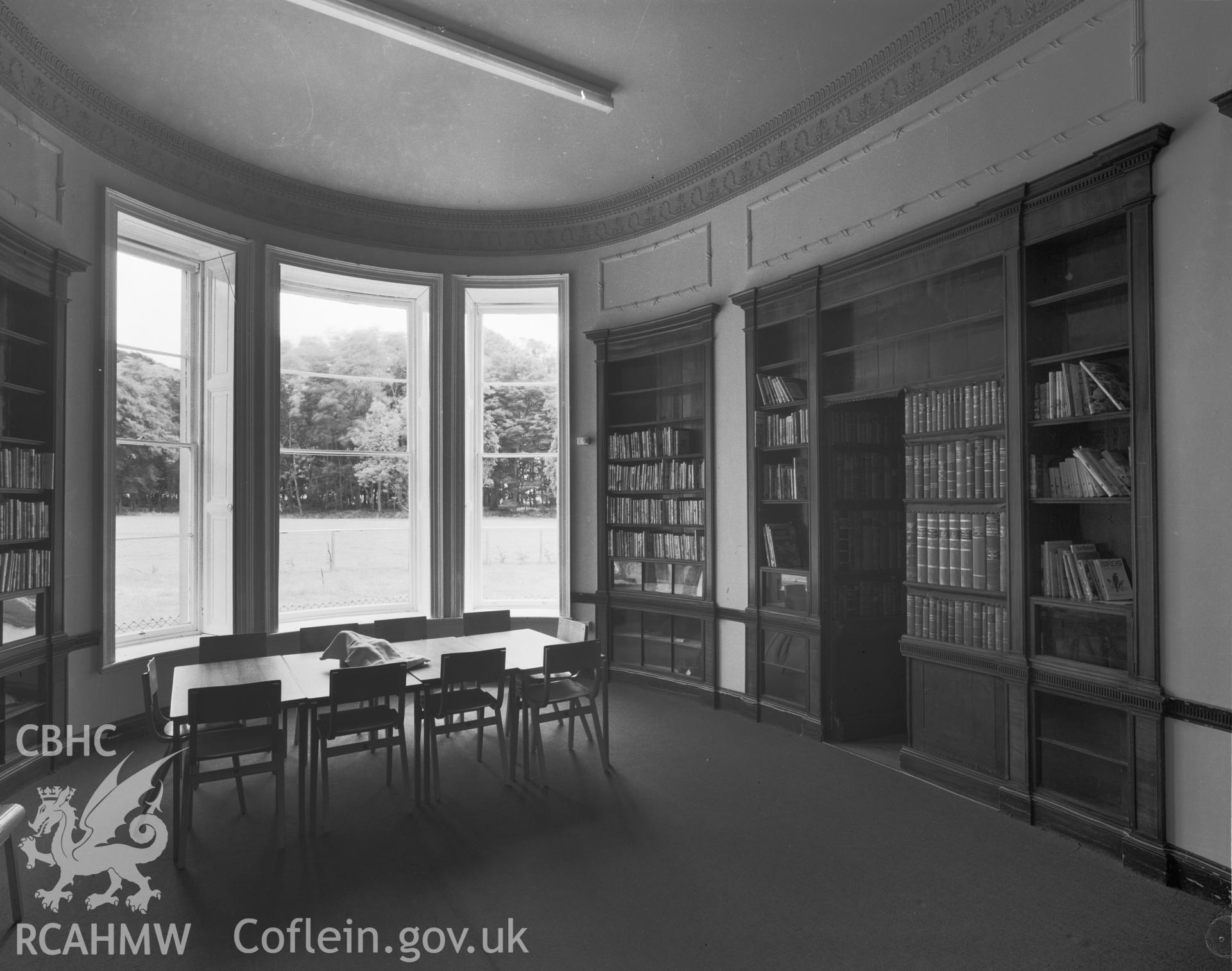 Digital copy of an acetate negative showing the library at Stout Hall.