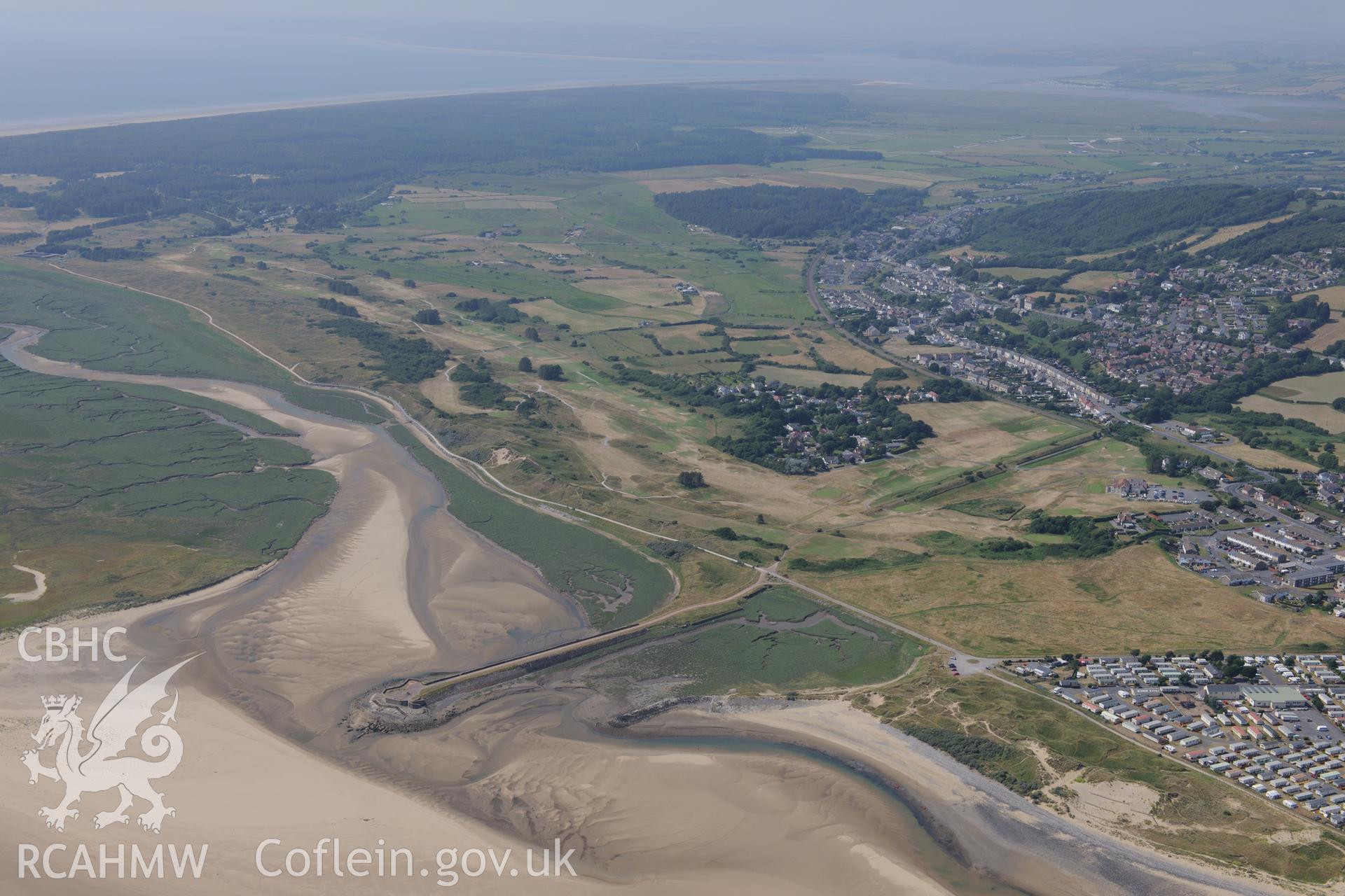 Pembrey and its harbour. Oblique aerial photograph taken during the Royal Commission?s programme of archaeological aerial reconnaissance by Toby Driver on 16th July 2013.