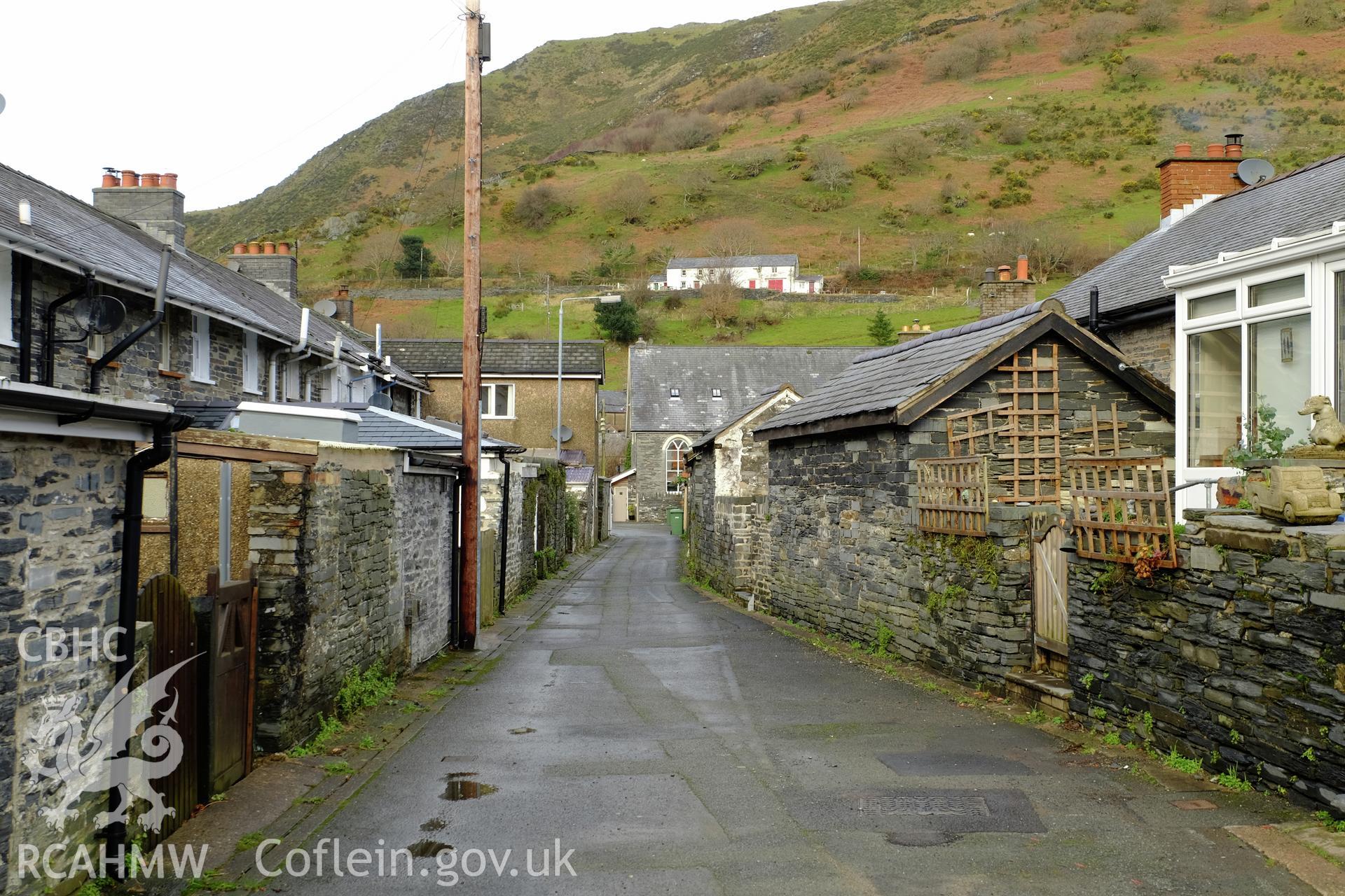 Colour photograph showing view looking north at alleyway (former tramroad) between Heol y Dwr and Heol Llanegryn, Abergynolwyn, produced by Richard Hayman 7th February 2017