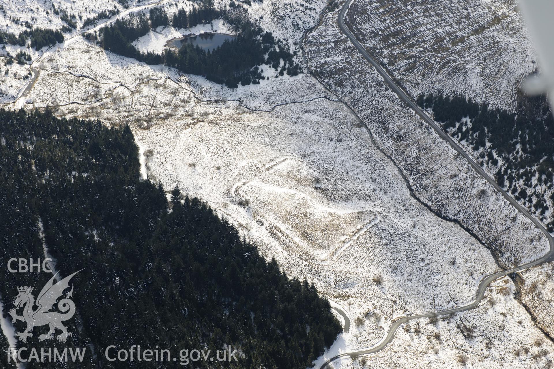 Cae Gaer Roman Fort, west of Llangurig. Oblique aerial photograph taken during the Royal Commission's programme of archaeological aerial reconnaissance by Toby Driver on 2nd April 2013.