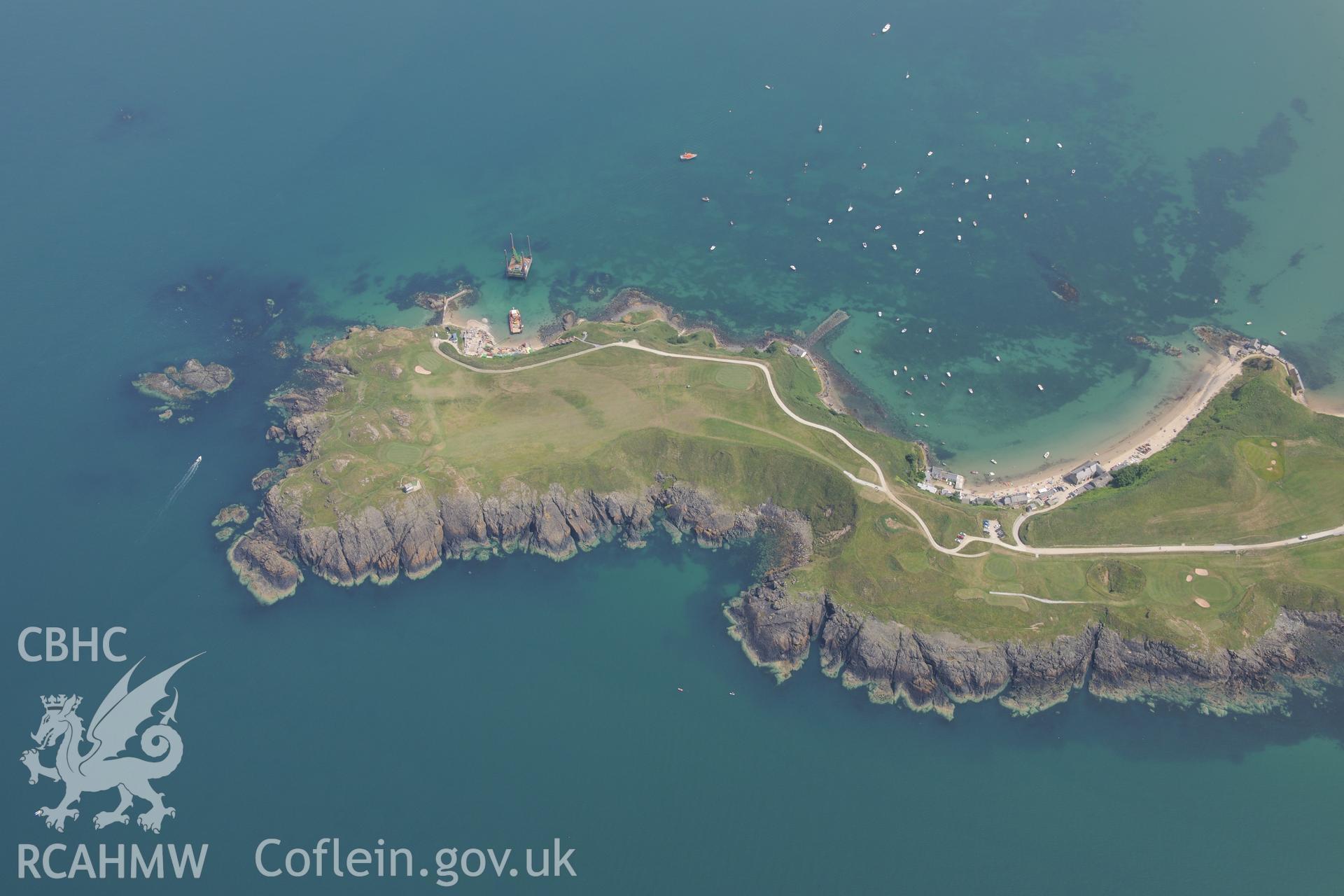 Lifeboat House, Lighthouse, Old Pier, Trwyn Porth Dinllaen Promontory Enclosure and Porth Dinllaen village. Oblique aerial photograph taken during the Royal Commission?s programme of archaeological aerial reconnaissance by Toby Driver on 12th July 2013.