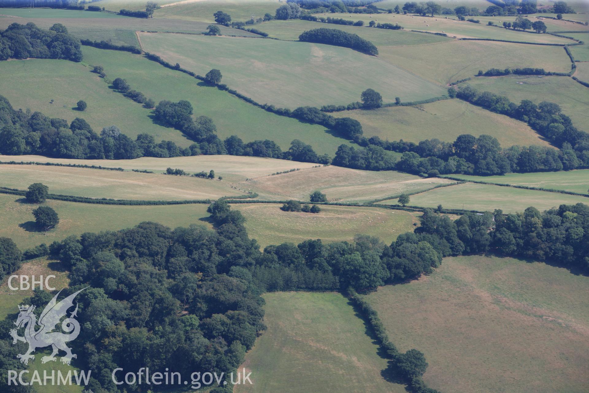 Cae Camp defended enclosure, Llanhenock, north east of Newport. Oblique aerial photograph taken during the Royal Commission?s programme of archaeological aerial reconnaissance by Toby Driver on 1st August 2013.